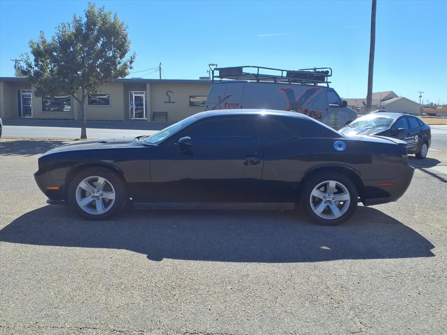 2014 Black Clear Coat Dodge Challenger SXT (2C3CDYAG8EH) with an Other engine, located at 1401 N. Hobart, Pampa, TX, 79065, (806) 665-9872, 35.549953, -100.975098 - **Unleash Your Inner Muscle with the 2014 Dodge Challenger SXT - Perfect for Adventure Lovers in Pampa, TX!**<br /> <br /> Are you ready to elevate your driving experience? The 2014 Dodge Challenger SXT is not just a car; it's a lifestyle choice for those who crave adventure, style, and a powerful r - Photo#4
