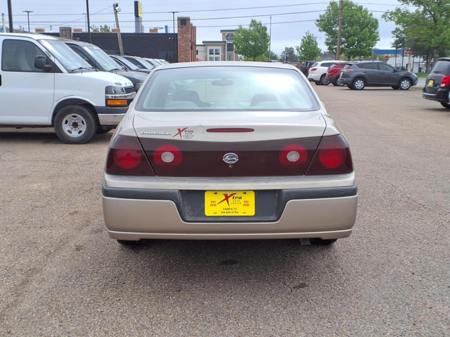 2001 Sandrift Metallic 49u Chevrolet Impala Base (2G1WF55E219) with an 3.4L 3L NA V6 overhead valves (OHV) 12V Fuel Injected engine, 4-Speed Automatic transmission, located at 1401 N. Hobart, Pampa, TX, 79065, (806) 665-9872, 35.549953, -100.975098 - Photo#3
