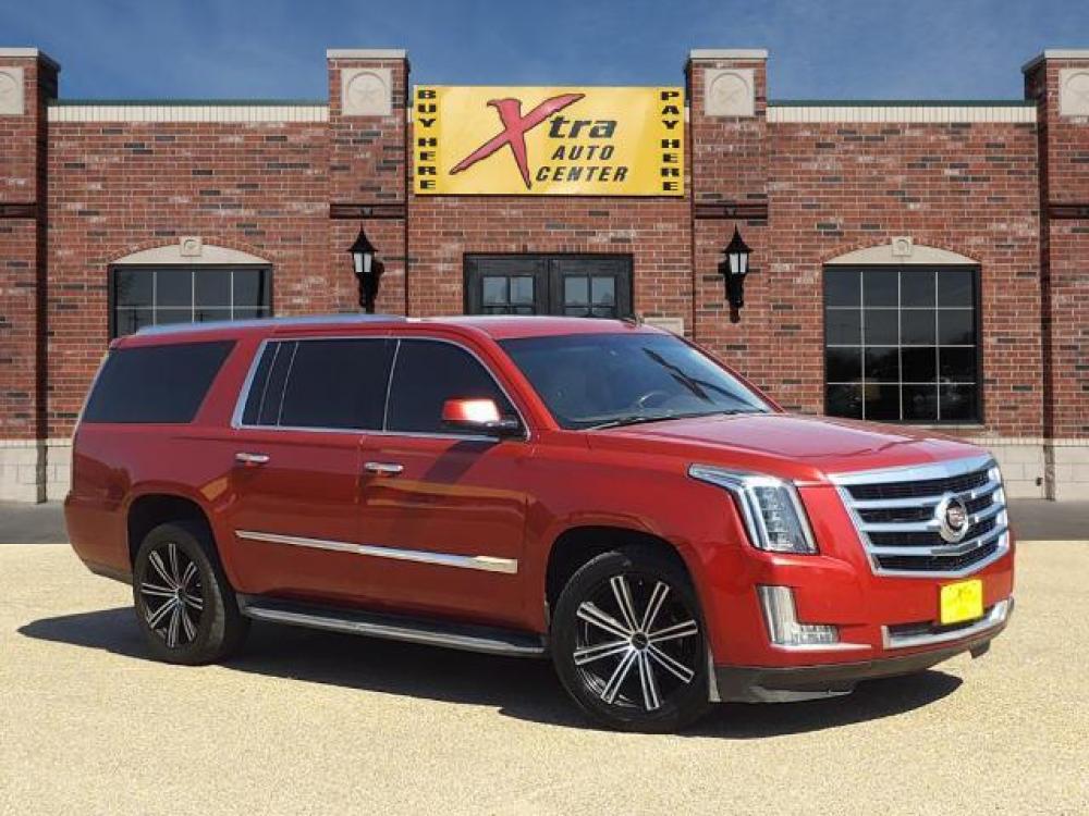2015 Crystal Red Tintcoat Cadillac Escalade ESV Luxury (1GYS4HKJ8FR) with an 6.2L EcoTec3 6.2L V8 420hp 460 Direct Injection engine, Automatic transmission, located at 1401 N. Hobart, Pampa, TX, 79065, (806) 665-9872, 35.549641, -100.971878 - Photo #0