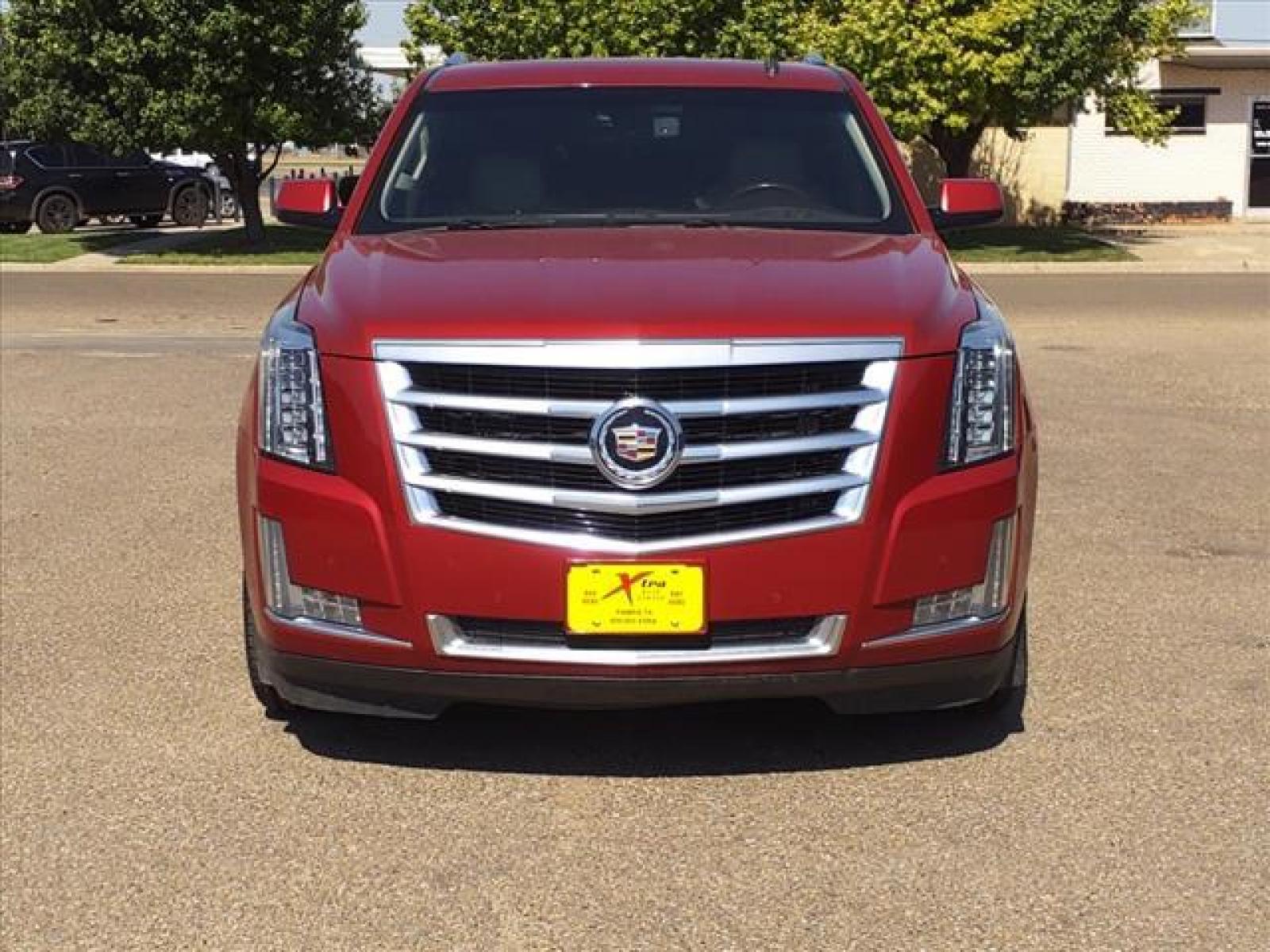 2015 Crystal Red Tintcoat Cadillac Escalade ESV Luxury (1GYS4HKJ8FR) with an 6.2L EcoTec3 6.2L V8 420hp 460 Direct Injection engine, Automatic transmission, located at 1401 N. Hobart, Pampa, TX, 79065, (806) 665-9872, 35.549641, -100.971878 - Photo #1