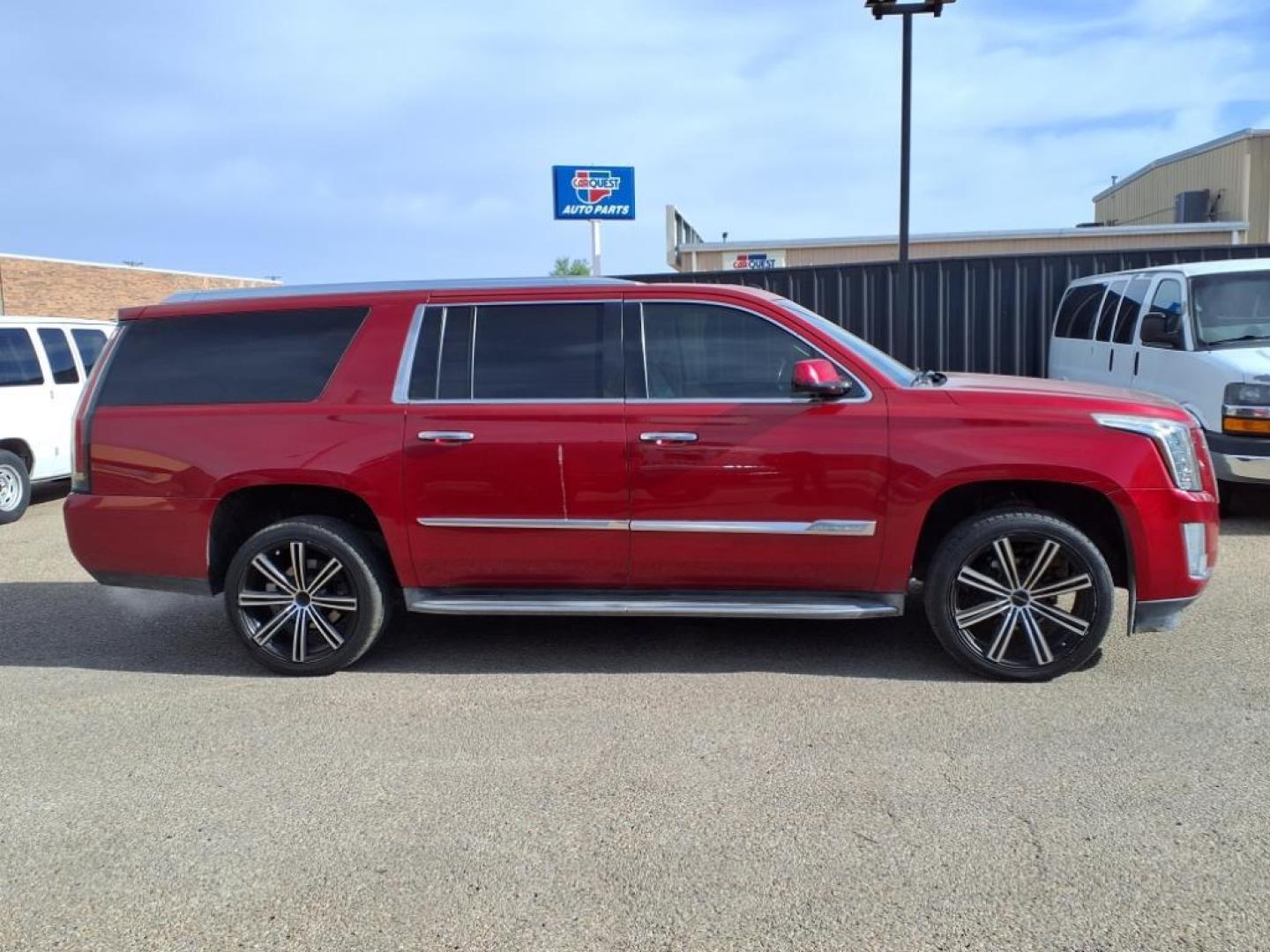 2015 Crystal Red Tintcoat Gbe Cadillac Escalade ESV Luxury (1GYS4HKJ8FR) with an 6.2L EcoTec3 6.2L V8 420hp 460ft. lbs. Direct Injection engine, 6-Speed Shiftable Automatic transmission, located at 1401 N. Hobart, Pampa, TX, 79065, (806) 665-9872, 35.549953, -100.975098 - Photo#2