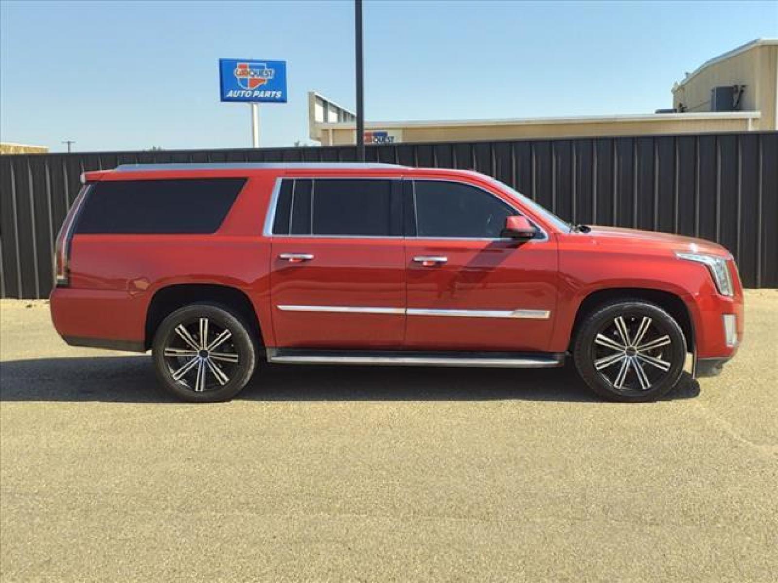 2015 Crystal Red Tintcoat Cadillac Escalade ESV Luxury (1GYS4HKJ8FR) with an 6.2L EcoTec3 6.2L V8 420hp 460 Direct Injection engine, Automatic transmission, located at 1401 N. Hobart, Pampa, TX, 79065, (806) 665-9872, 35.549641, -100.971878 - Photo #2