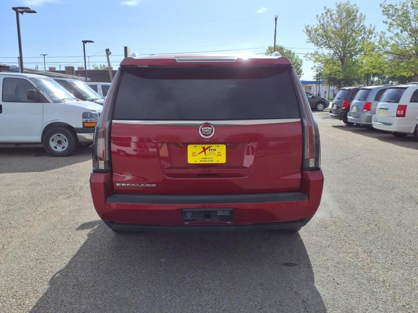 2015 Crystal Red Tintcoat Gbe Cadillac Escalade ESV Luxury (1GYS4HKJ8FR) with an 6.2L EcoTec3 6.2L V8 420hp 460ft. lbs. Direct Injection engine, 6-Speed Shiftable Automatic transmission, located at 1401 N. Hobart, Pampa, TX, 79065, (806) 665-9872, 35.549953, -100.975098 - Photo#3