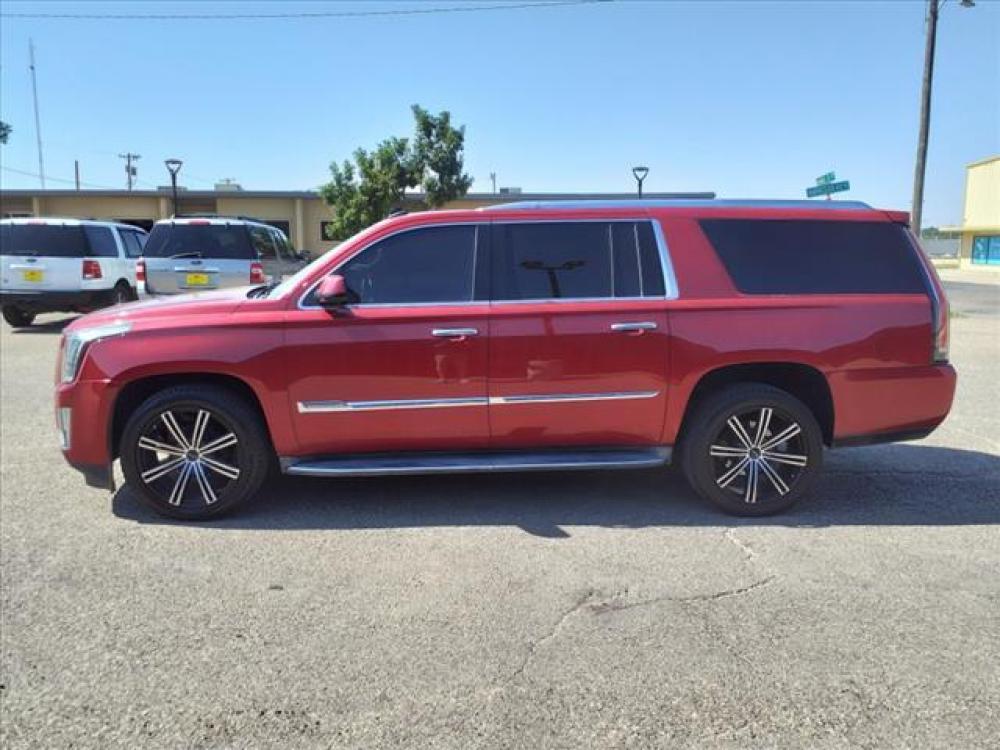 2015 Crystal Red Tintcoat Cadillac Escalade ESV Luxury (1GYS4HKJ8FR) with an 6.2L EcoTec3 6.2L V8 420hp 460 Direct Injection engine, Automatic transmission, located at 1401 N. Hobart, Pampa, TX, 79065, (806) 665-9872, 35.549641, -100.971878 - Photo #4