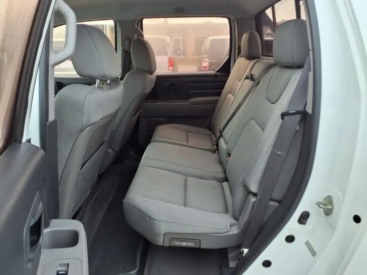 2010 White Honda RIDGELINE RT (5FPYK1F29AB) with an 3.5L engine, Automatic transmission, located at 1401 N. Hobart, Pampa, TX, 79065, (806) 665-9872, 35.549953, -100.975098 - ### 2010 Honda Ridgeline RT: Your Perfect Companion for Weekend Adventures!<br /> <br /> Are you ready to elevate your weekend getaways, family outings, or daily commutes? Look no further than this versatile 2010 Honda Ridgeline RT, available now at Xtra Auto Center in Pampa, TX. This dependable pic - Photo#11