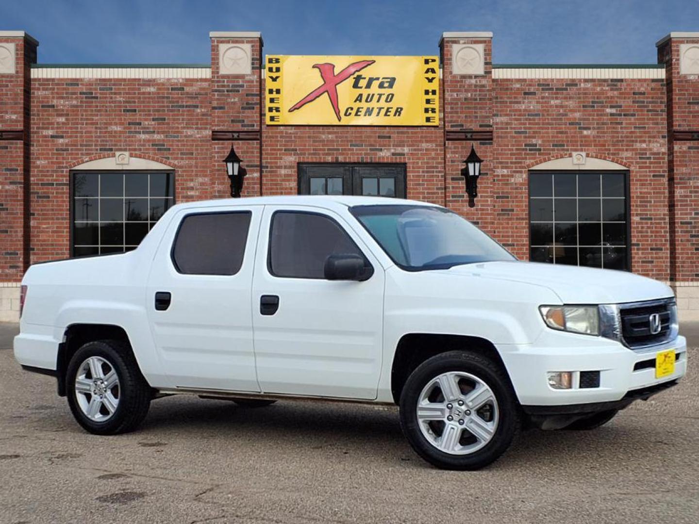 2010 White Honda Ridgeline RT (5FPYK1F29AB) with an 3.5L 6 Cylinder Fuel Injected engine, Automatic transmission, located at 1401 N. Hobart, Pampa, TX, 79065, (806) 665-9872, 35.549953, -100.975098 - Photo#0