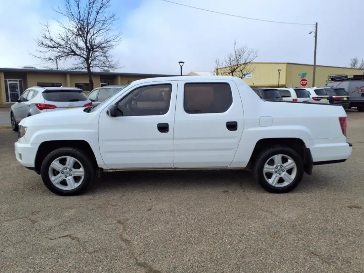 2010 White Honda Ridgeline RT (5FPYK1F29AB) with an Other engine, Automatic transmission, located at 1401 N. Hobart, Pampa, TX, 79065, (806) 665-9872, 35.549953, -100.975098 - ### 2010 Honda Ridgeline RT: Your Perfect Companion for Weekend Adventures!<br /> <br /> Are you ready to elevate your weekend getaways, family outings, or daily commutes? Look no further than this versatile 2010 Honda Ridgeline RT, available now at Xtra Auto Center in Pampa, TX. This dependable pic - Photo#4
