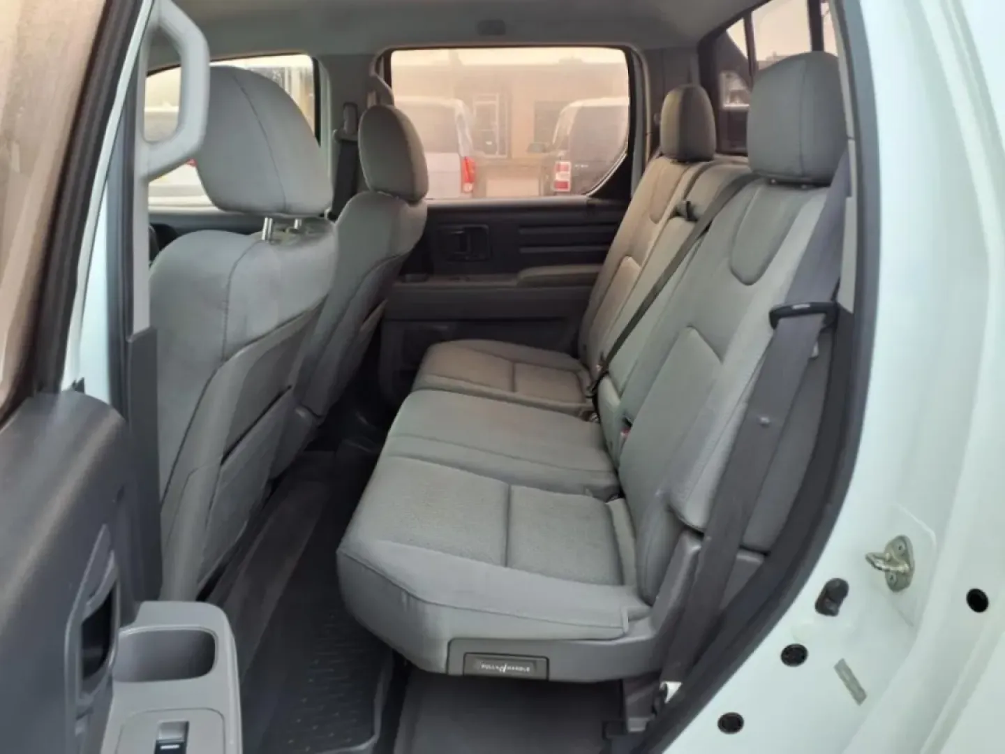 2010 White Honda Ridgeline RT (5FPYK1F29AB) with an Other engine, Automatic transmission, located at 1401 N. Hobart, Pampa, TX, 79065, (806) 665-9872, 35.549953, -100.975098 - ### 2010 Honda Ridgeline RT: Your Perfect Companion for Weekend Adventures!<br /> <br /> Are you ready to elevate your weekend getaways, family outings, or daily commutes? Look no further than this versatile 2010 Honda Ridgeline RT, available now at Xtra Auto Center in Pampa, TX. This dependable pic - Photo#11