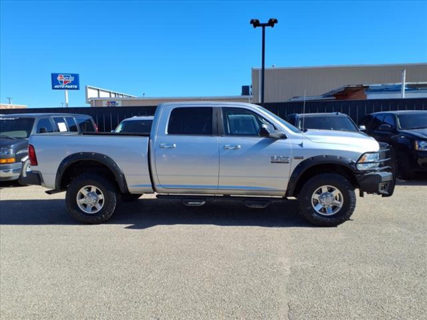 2013 Bright Silver Metallic Clear Coat RAM 2500 Lone Star (3C6TR5DT9DG) with an 5.7L HEMI 5.7L V8 383hp 400ft. lbs. Sequential Multiport Fuel Injection engine, 6-Speed Shiftable Automatic transmission, located at 1401 N. Hobart, Pampa, TX, 79065, (806) 665-9872, 35.549953, -100.975098 - Photo#2