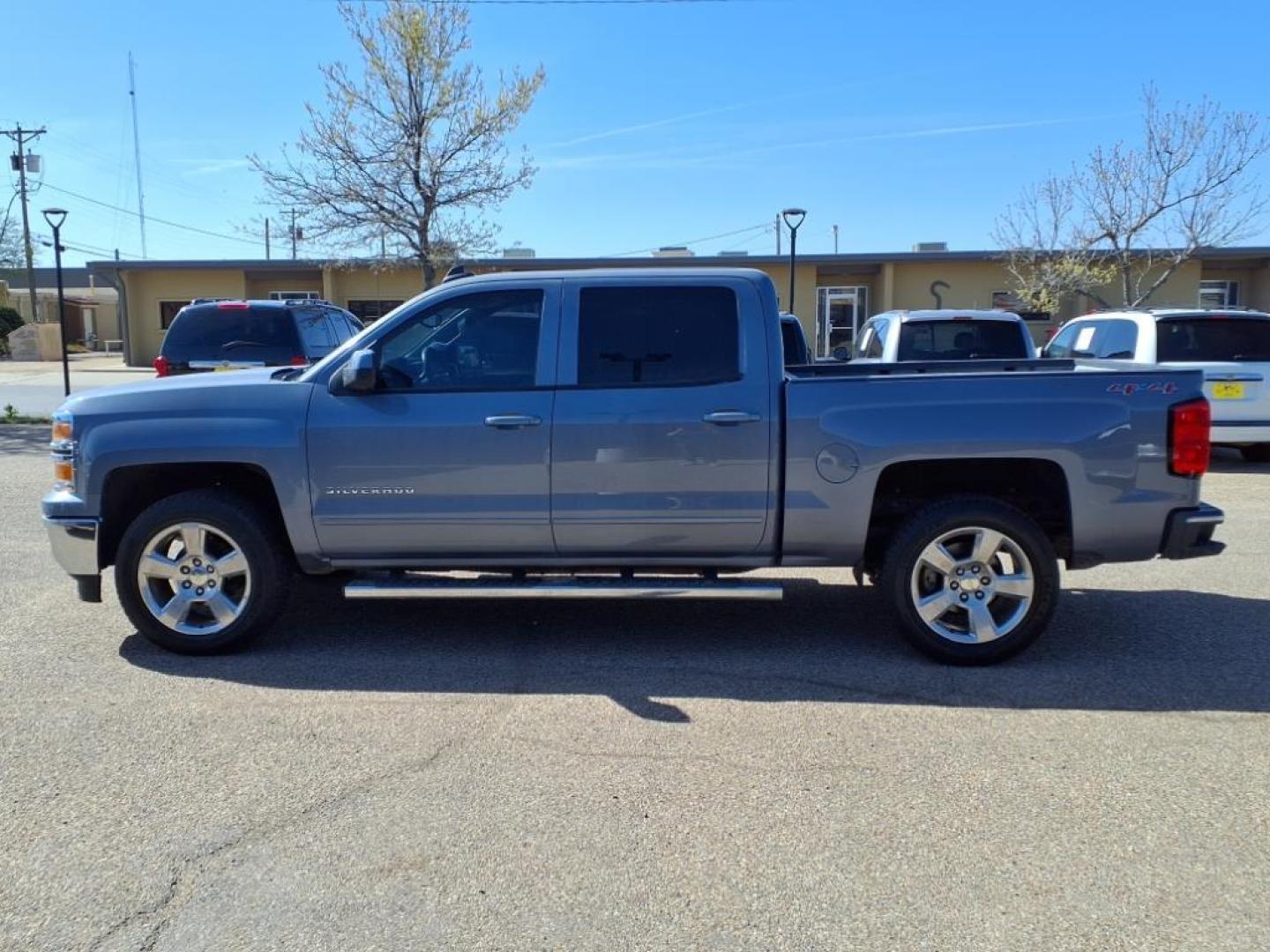 2015 Lt. Blue Chevrolet Silverado 1500 LT (3GCUKREC5FG) with an 5.3L EcoTec3 5.3L V8 355hp 383ft. lbs. Direct Injection engine, 6-Speed Shiftable Automatic w/Overdrive transmission, located at 1401 N. Hobart, Pampa, TX, 79065, (806) 665-9872, 35.549953, -100.975098 - Photo#4