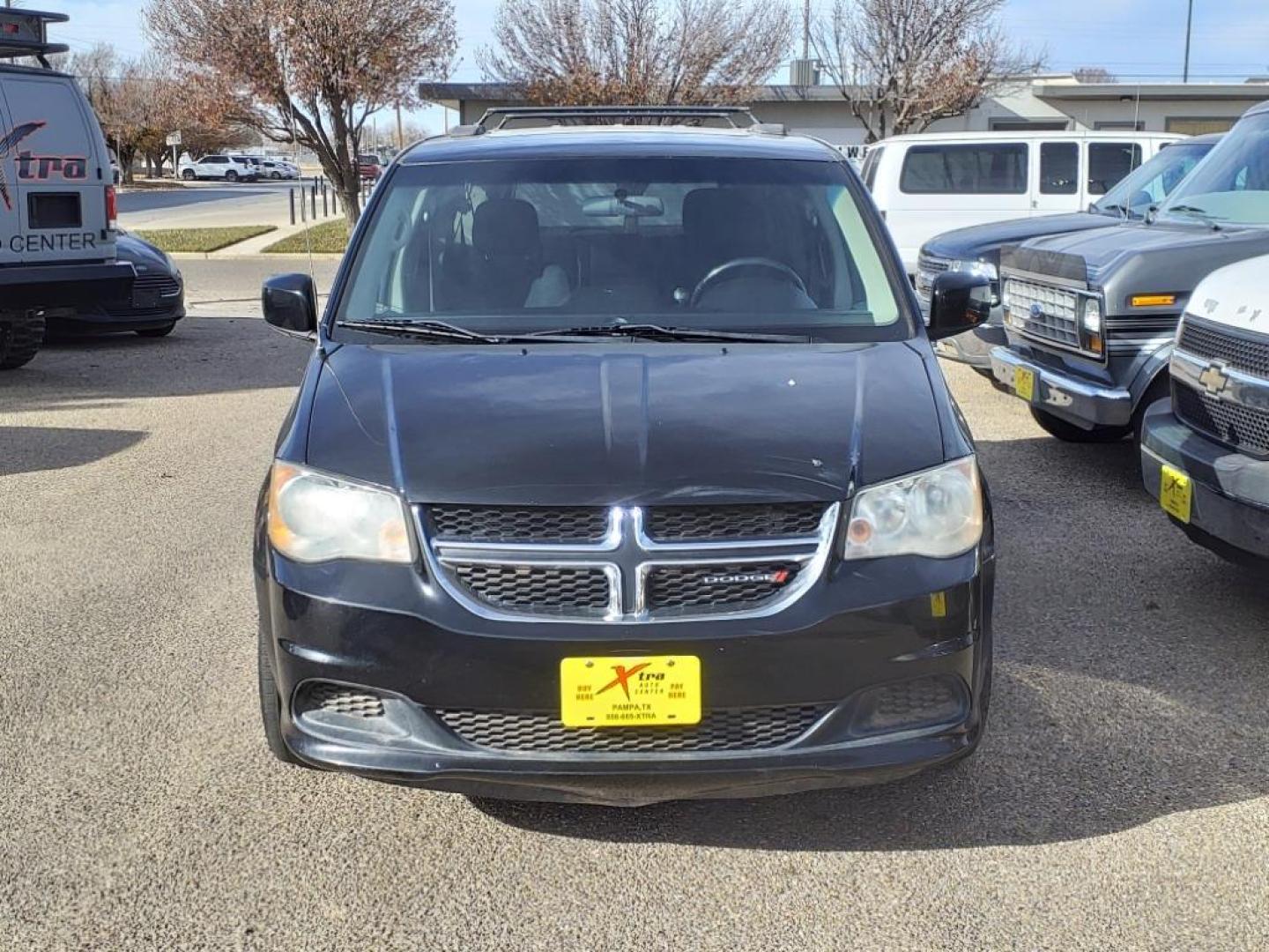 2014 Brilliant Black Crystal Pearl Coat Pxr Dodge Grand Caravan SXT (2C4RDGCGXER) with an 3.6L Pentastar 3.6L Flex Fuel V6 283hp 260ft. lbs. Sequential Multiport Fuel Injection engine, 6-Speed Shiftable Automatic transmission, located at 1401 N. Hobart, Pampa, TX, 79065, (806) 665-9872, 35.549953, -100.975098 - Photo#1