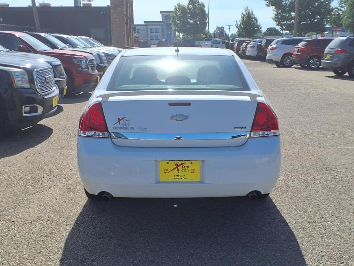 2010 Summit White Chevrolet Impala LTZ (2G1WC5EMXA1) with an 3.9L 3.9L Flex Fuel V6 230hp 235ft. lbs. Fuel Injected engine, 4-Speed Automatic transmission, located at 1401 N. Hobart, Pampa, TX, 79065, (806) 665-9872, 35.549953, -100.975098 - Photo#3