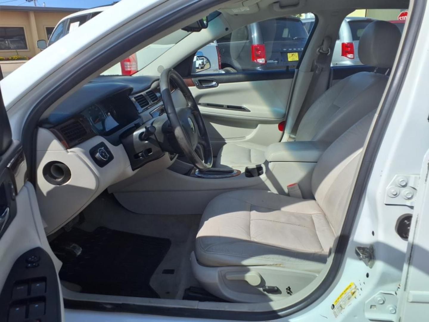 2010 Summit White Chevrolet Impala LTZ (2G1WC5EMXA1) with an 3.9L 3.9L Flex Fuel V6 230hp 235ft. lbs. Fuel Injected engine, 4-Speed Automatic transmission, located at 1401 N. Hobart, Pampa, TX, 79065, (806) 665-9872, 35.549953, -100.975098 - Photo#11