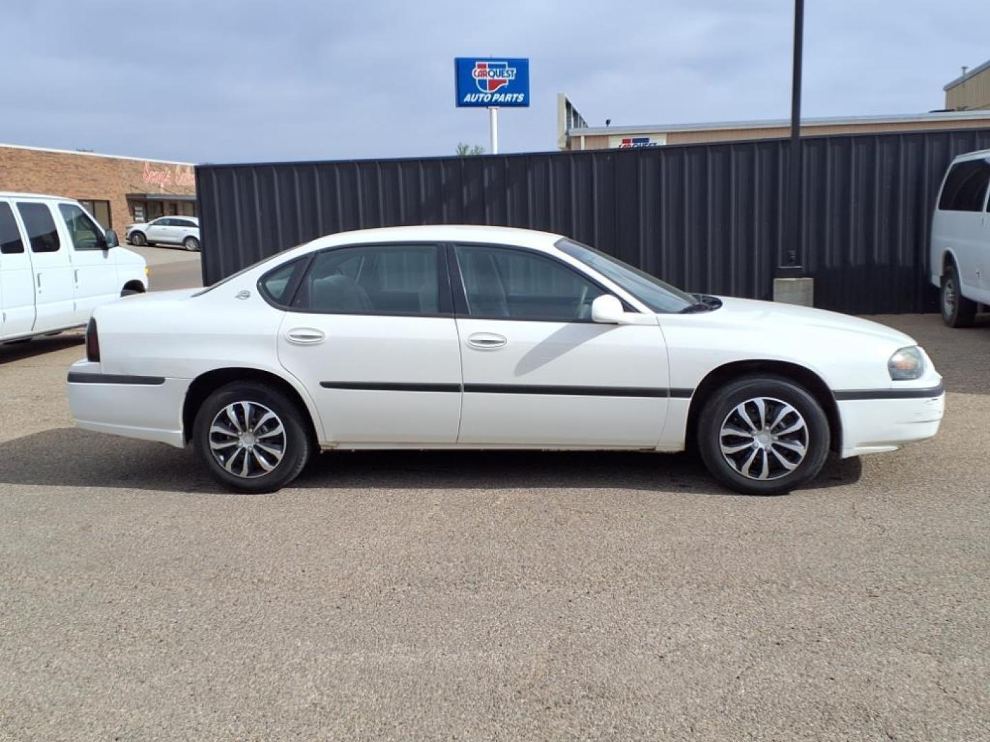 2004 White 40u Chevrolet Impala Base (2G1WF52E449) with an 3.4L 3L NA V6 overhead valves (OHV) 12V Fuel Injected engine, 4-Speed Automatic transmission, located at 1401 N. Hobart, Pampa, TX, 79065, (806) 665-9872, 35.549953, -100.975098 - Photo#2