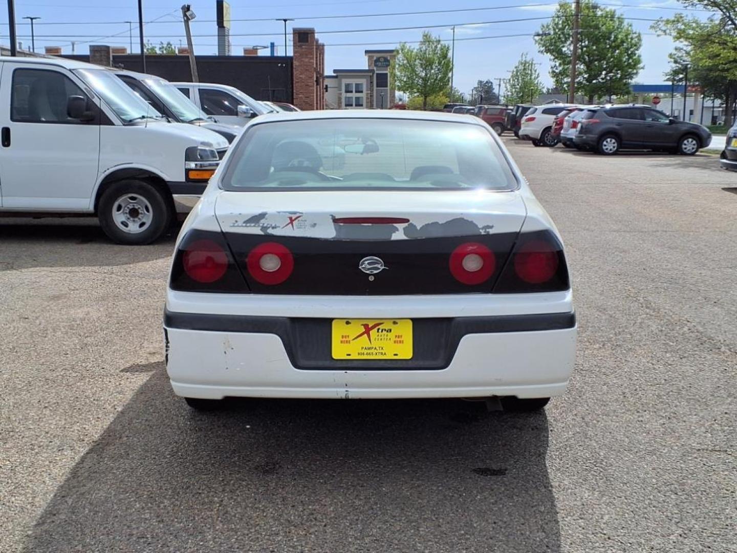 2004 White 40u Chevrolet Impala Base (2G1WF52E449) with an 3.4L 3L NA V6 overhead valves (OHV) 12V Fuel Injected engine, 4-Speed Automatic transmission, located at 1401 N. Hobart, Pampa, TX, 79065, (806) 665-9872, 35.549953, -100.975098 - Photo#3