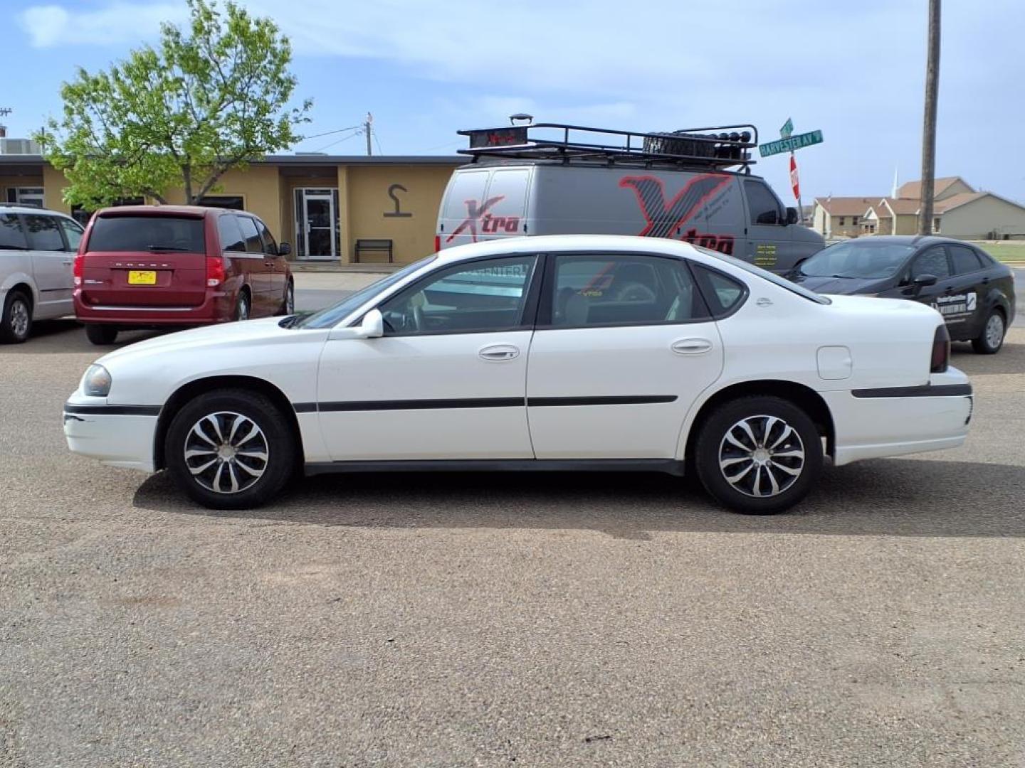 2004 White 40u Chevrolet Impala Base (2G1WF52E449) with an 3.4L 3L NA V6 overhead valves (OHV) 12V Fuel Injected engine, 4-Speed Automatic transmission, located at 1401 N. Hobart, Pampa, TX, 79065, (806) 665-9872, 35.549953, -100.975098 - Photo#4