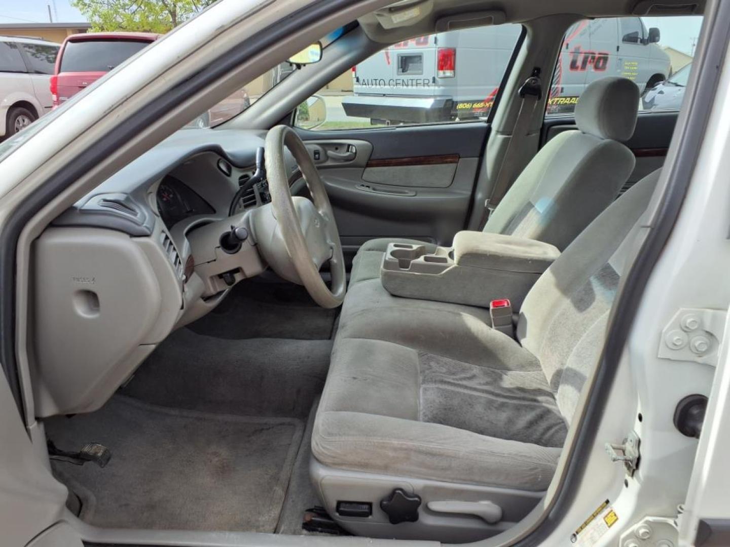 2004 White 40u Chevrolet Impala Base (2G1WF52E449) with an 3.4L 3L NA V6 overhead valves (OHV) 12V Fuel Injected engine, 4-Speed Automatic transmission, located at 1401 N. Hobart, Pampa, TX, 79065, (806) 665-9872, 35.549953, -100.975098 - Photo#9