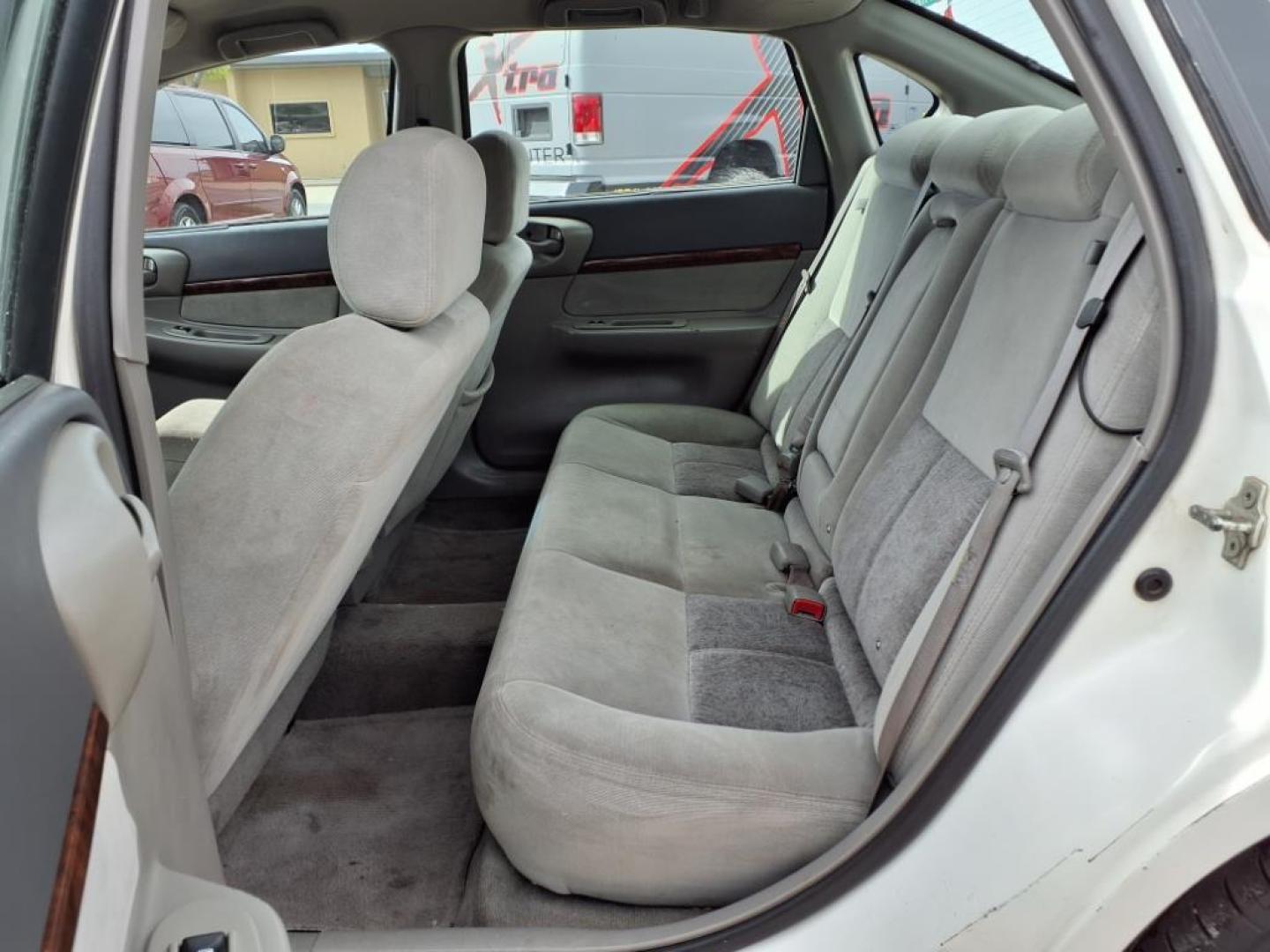 2004 White 40u Chevrolet Impala Base (2G1WF52E449) with an 3.4L 3L NA V6 overhead valves (OHV) 12V Fuel Injected engine, 4-Speed Automatic transmission, located at 1401 N. Hobart, Pampa, TX, 79065, (806) 665-9872, 35.549953, -100.975098 - Photo#10