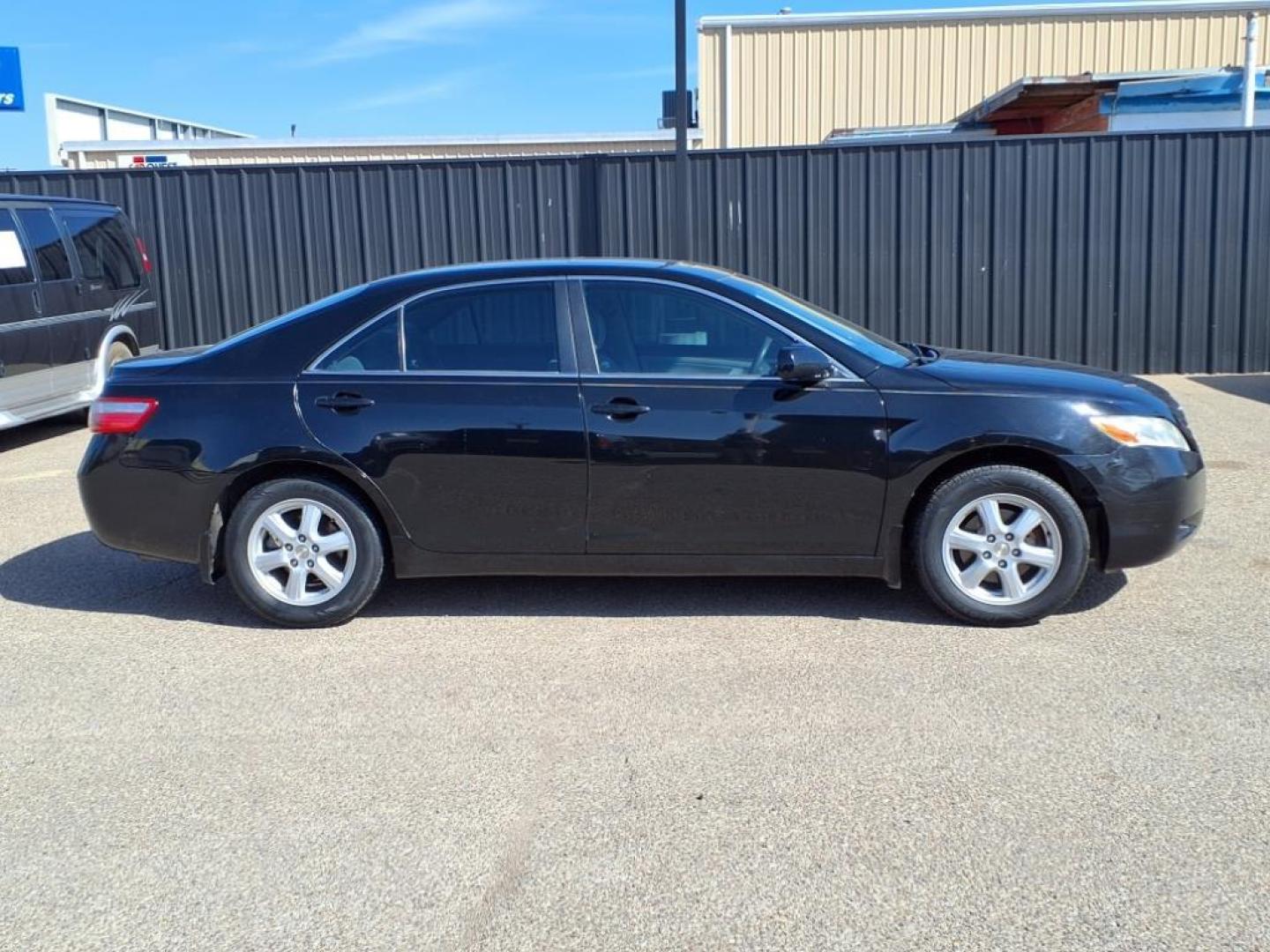 2009 Black 202 Toyota Camry LE (4T1BE46K79U) with an 2.4L 2.4L I4 158hp 161ft. lbs. Fuel Injected engine, 5-Speed Automatic transmission, located at 1401 N. Hobart, Pampa, TX, 79065, (806) 665-9872, 35.549953, -100.975098 - Photo#2