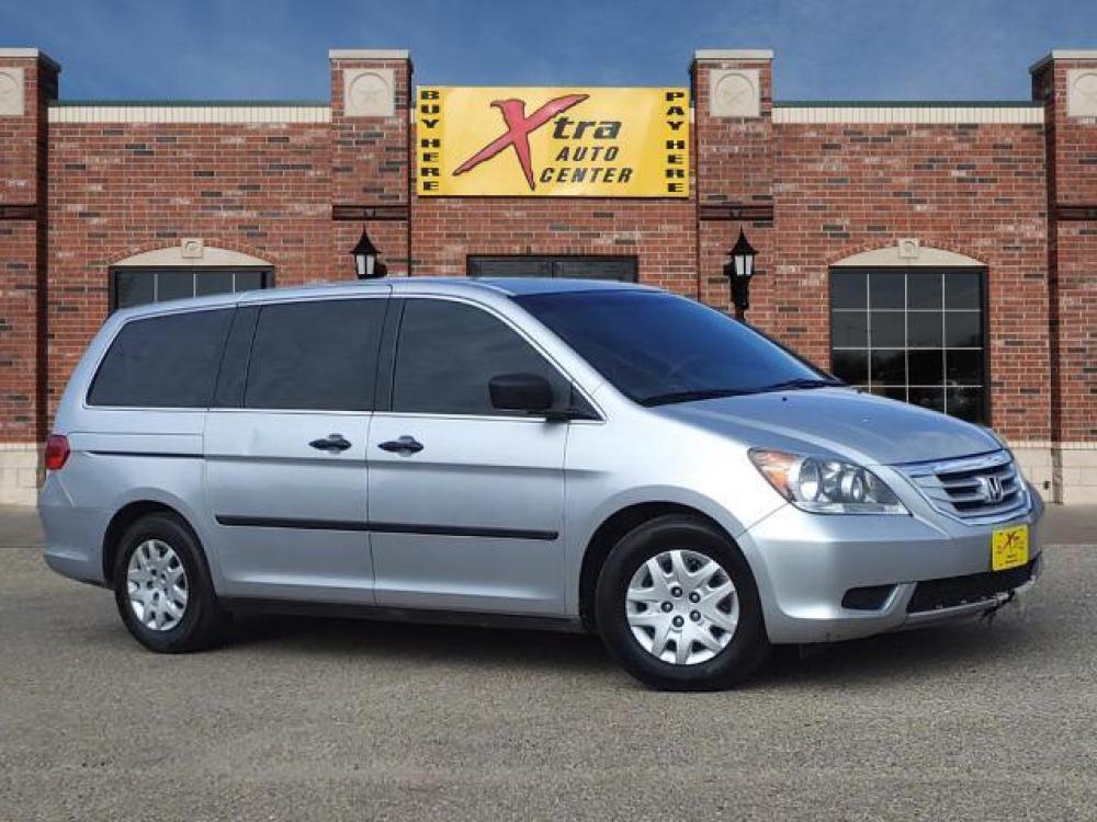 2010 Alabaster Silver Metallic Honda Odyssey LX (5FNRL3H24AB) with an 3.5L 3.5L V6 244hp 240ft. lbs. Sequential Multiport Fuel Injection engine, 5-Speed Automatic transmission, located at 1401 N. Hobart, Pampa, TX, 79065, (806) 665-9872, 35.549641, -100.971878 - Photo #0