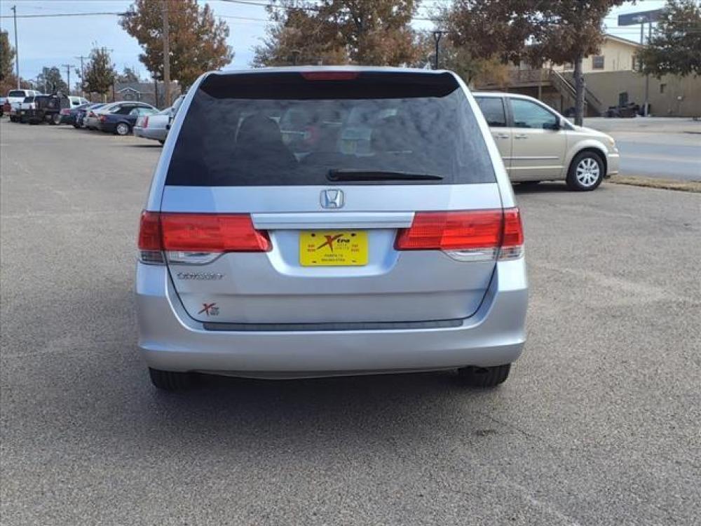 2010 Alabaster Silver Metallic Honda Odyssey LX (5FNRL3H24AB) with an 3.5L 3.5L V6 244hp 240ft. lbs. Sequential Multiport Fuel Injection engine, 5-Speed Automatic transmission, located at 1401 N. Hobart, Pampa, TX, 79065, (806) 665-9872, 35.549641, -100.971878 - Photo #2