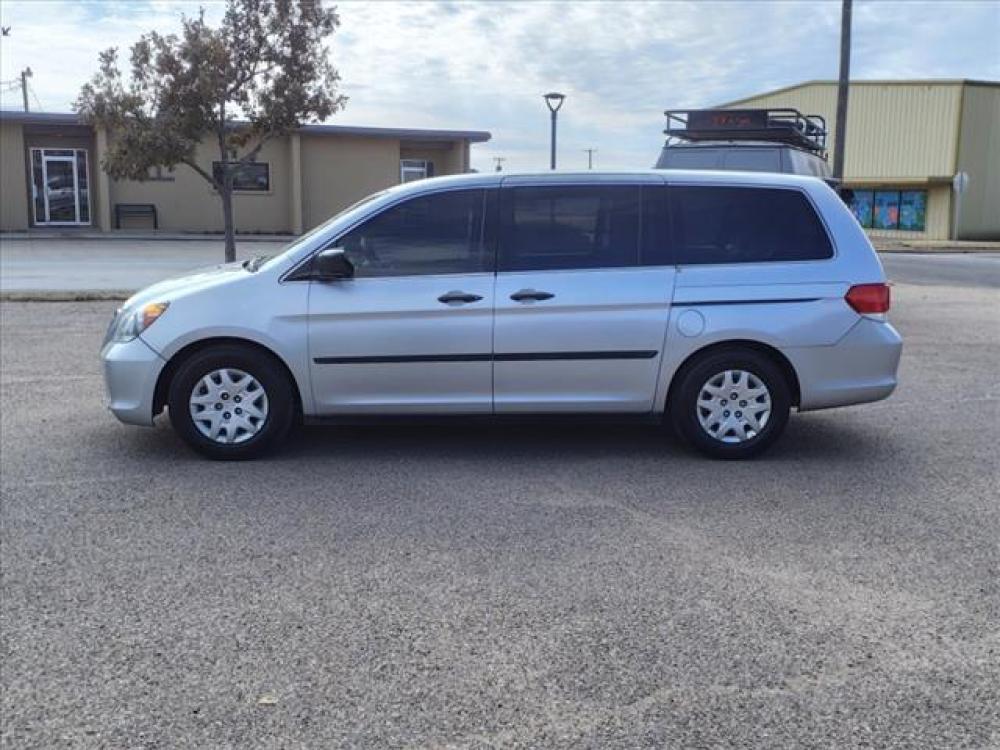 2010 Alabaster Silver Metallic Honda Odyssey LX (5FNRL3H24AB) with an 3.5L 3.5L V6 244hp 240ft. lbs. Sequential Multiport Fuel Injection engine, 5-Speed Automatic transmission, located at 1401 N. Hobart, Pampa, TX, 79065, (806) 665-9872, 35.549641, -100.971878 - Photo #3