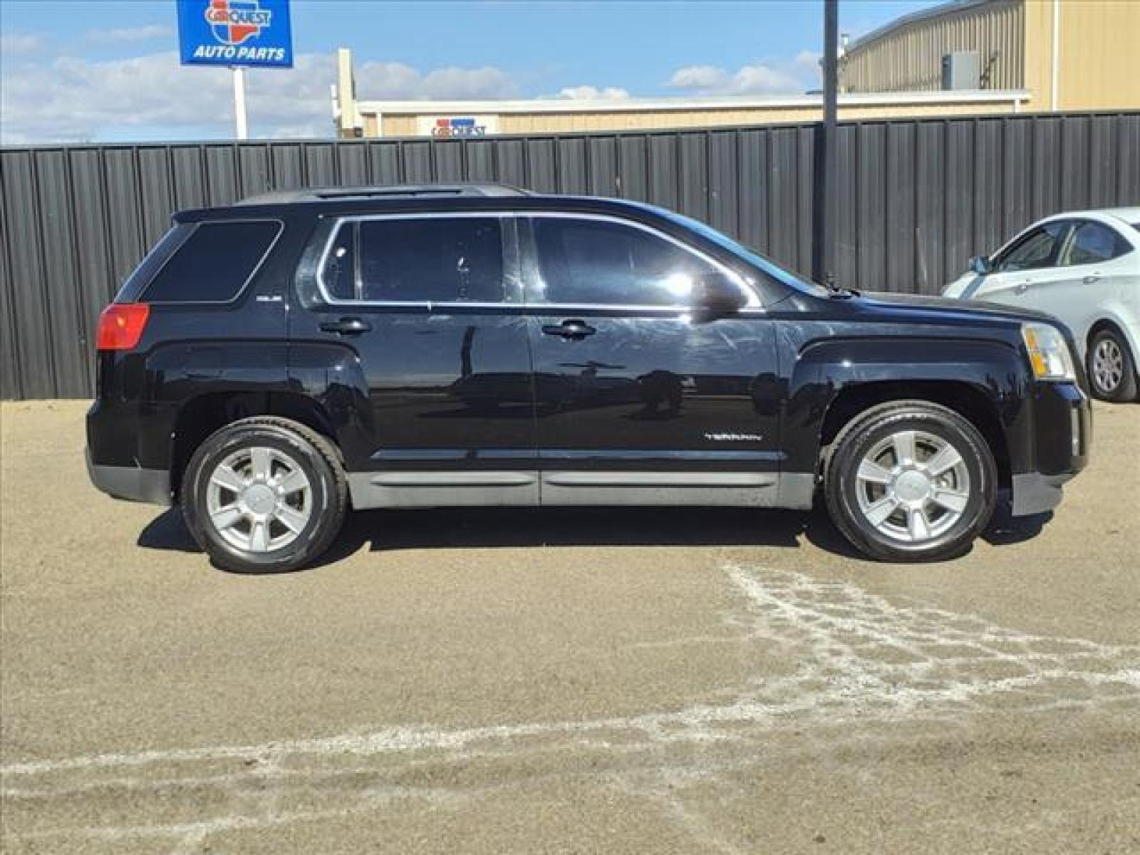 2011 Carbon Black Metallic GMC Terrain SLE-2 (2CTALSEC8B6) with an 2.4L 2.4L I4 182hp 172ft. lbs. Direct Injection engine, 6-Speed Shiftable Automatic transmission, located at 1401 N. Hobart, Pampa, TX, 79065, (806) 665-9872, 35.549641, -100.971878 - Photo #2
