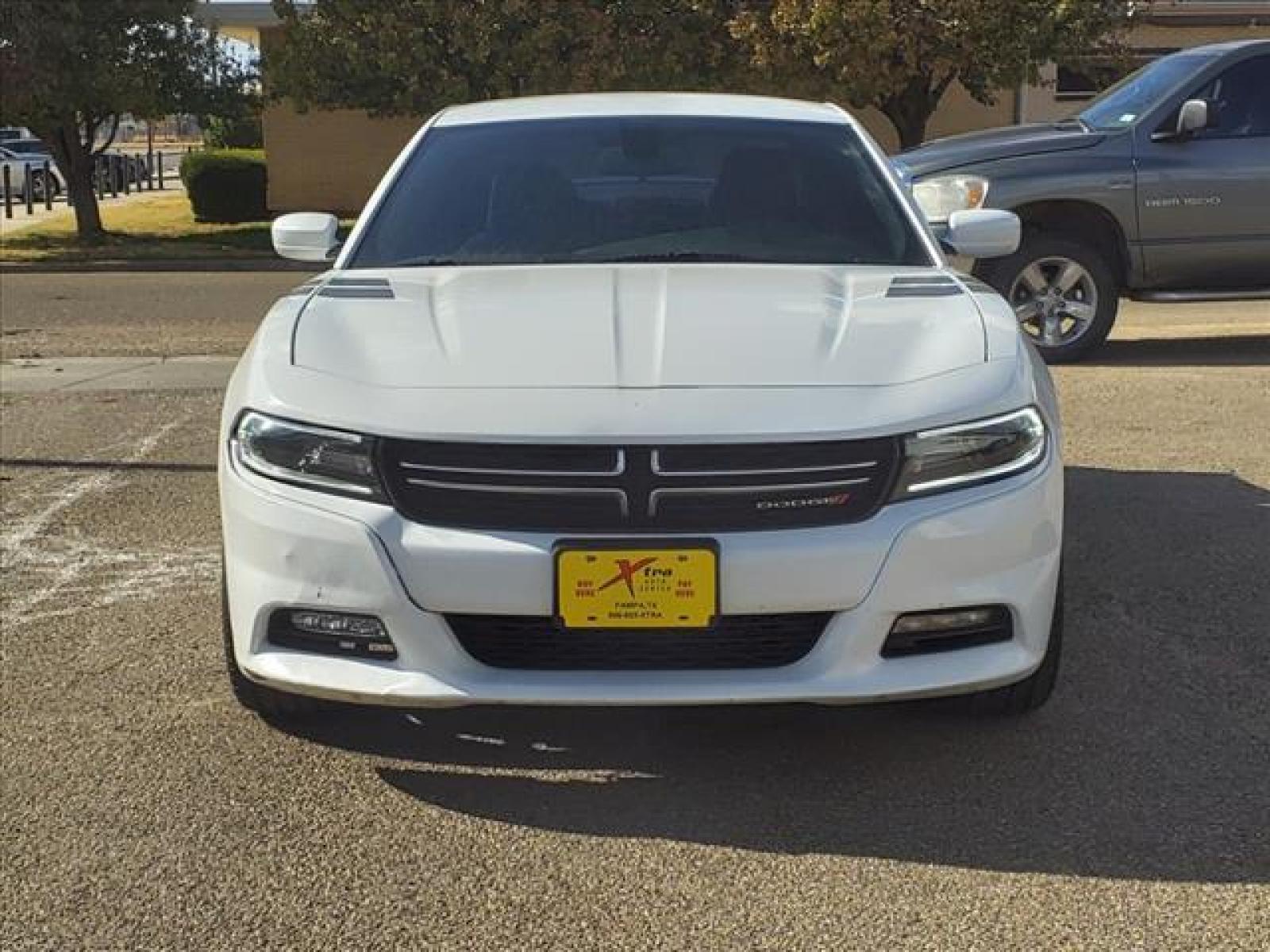 2015 Bright White Clear Coat Dodge Charger SE (2C3CDXBG9FH) with an 3.6L Pentastar 3.6L V6 292hp 2 Sequential Multiport Fuel Injection engine, 8-Speed Shiftable Automatic transmission, located at 1401 N. Hobart, Pampa, TX, 79065, (806) 665-9872, 35.549641, -100.971878 - Photo #1