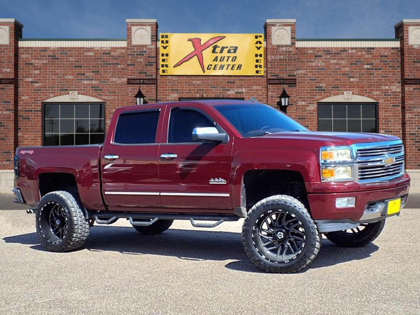 2014 Deep Ruby Metallic Chevrolet Silverado 1500 High Country (3GCUKTEC3EG) with an 5.3L EcoTec3 5.3L Flex Fuel V8 355hp 383ft. lbs. Direct Injection engine, 6-Speed Shiftable Automatic w/Overdrive transmission, located at 1401 N. Hobart, Pampa, TX, 79065, (806) 665-9872, 35.549953, -100.975098 - Photo#0