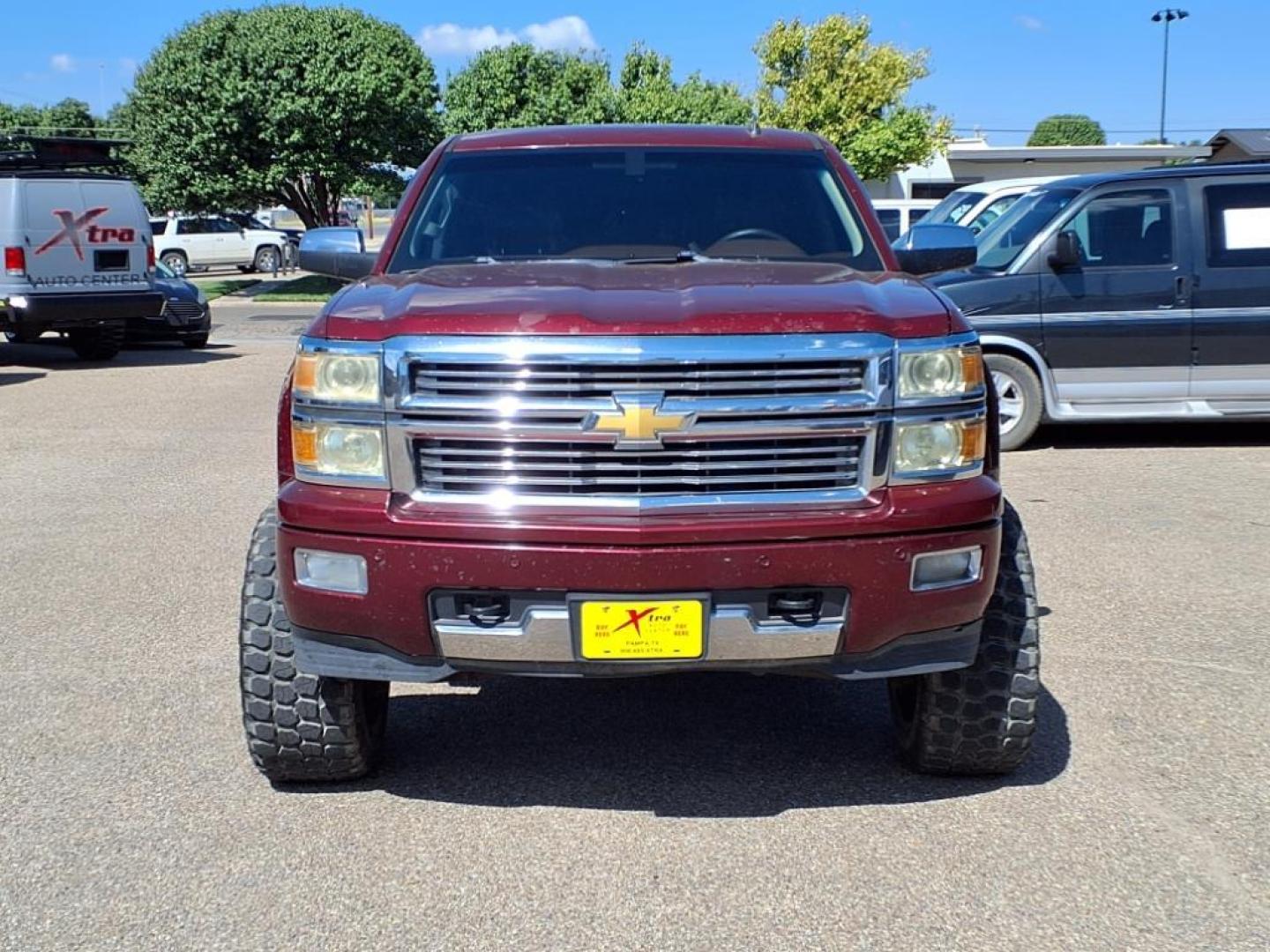 2014 Deep Ruby Metallic Chevrolet Silverado 1500 High Country (3GCUKTEC3EG) with an 5.3L EcoTec3 5.3L Flex Fuel V8 355hp 383ft. lbs. Direct Injection engine, 6-Speed Shiftable Automatic w/Overdrive transmission, located at 1401 N. Hobart, Pampa, TX, 79065, (806) 665-9872, 35.549953, -100.975098 - Photo#1