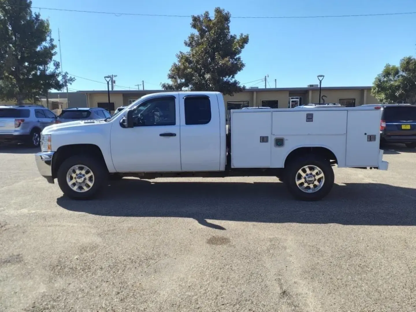 2013 Summit White Chevrolet Silverado 2500HD Work Truck Ext. Cab 2WD (1GB2CVC85DZ) with an Other engine, Automatic transmission, located at 1401 N. Hobart, Pampa, TX, 79065, (806) 665-9872, 35.549953, -100.975098 - **Unleash Your Adventures with the 2013 Chevrolet Silverado 2500HD at Xtra Auto Center in Pampa, TX!**<br /> <br /> Are you ready to elevate your work and play? The 2013 Chevrolet Silverado 2500HD is here to make that possible! This rugged and reliable pickup is perfect for everyone from hard-workin - Photo#4