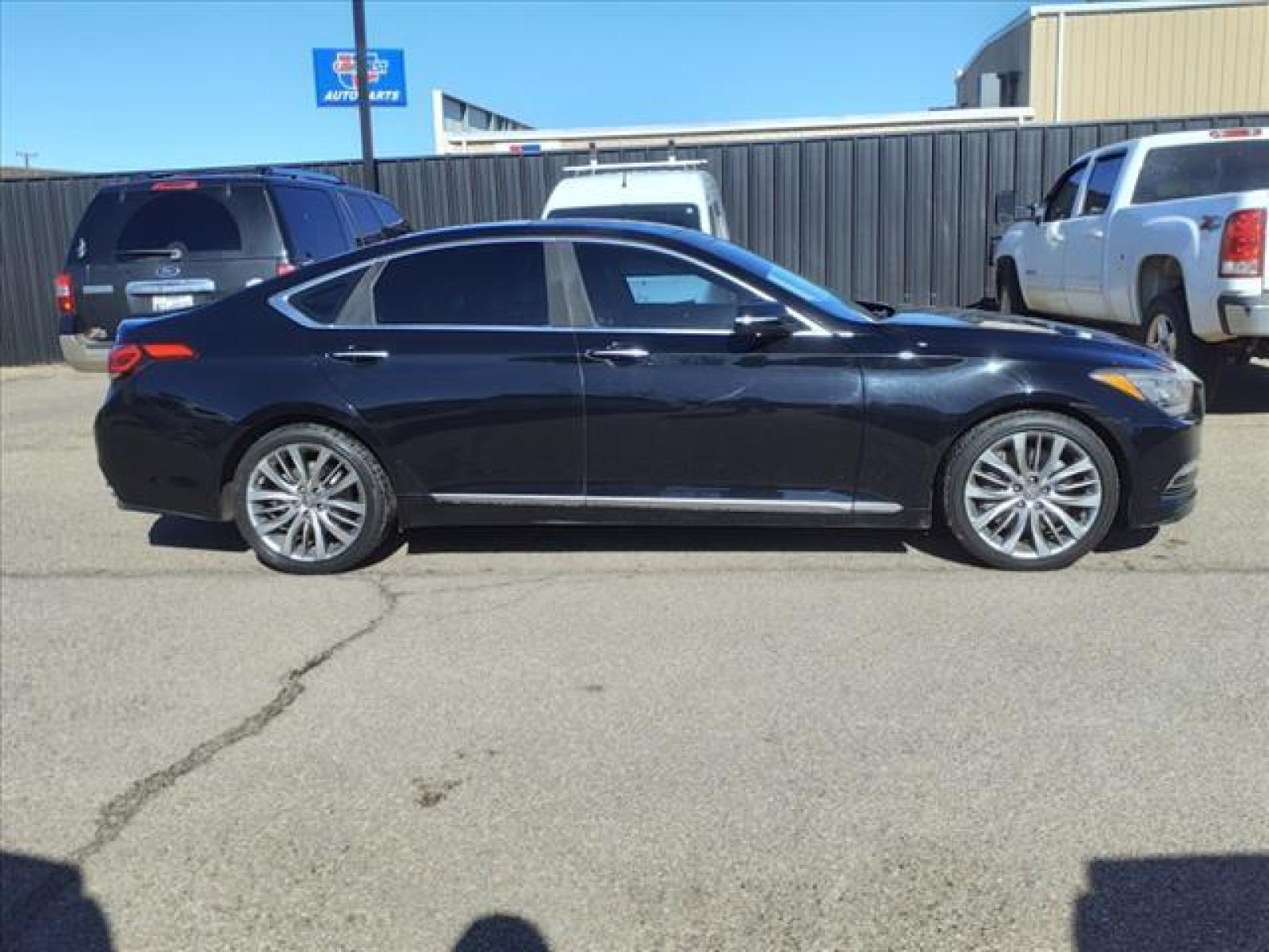 2015 Caspian Black Hyundai Genesis 5.0L (KMHGN4JF4FU) with an 5.0L 5.0L V8 420hp 383ft. lbs. Fuel Injected engine, 8-Speed Shiftable Automatic transmission, located at 1401 N. Hobart, Pampa, TX, 79065, (806) 665-9872, 35.549641, -100.971878 - Photo #2