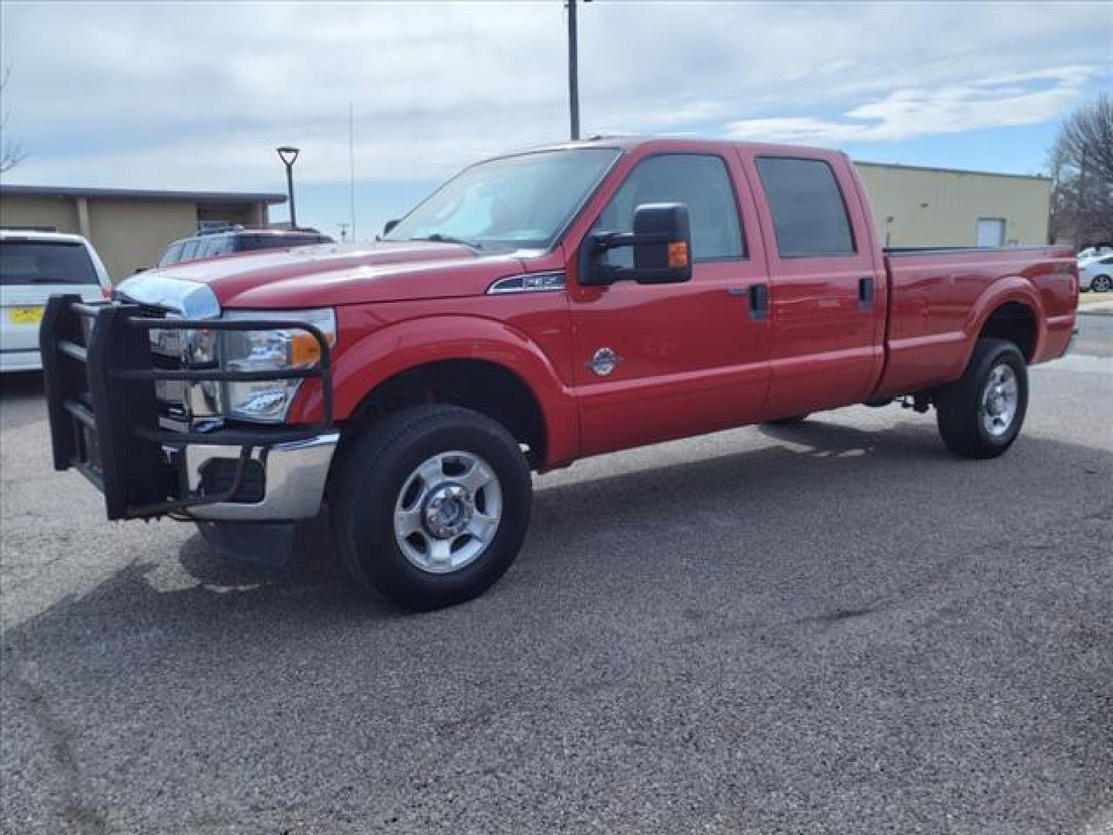 2012 Vermillion Red Ford F-350 Super Duty XLT (1FT8W3BT2CE) with an 6.7L Power Stroke 6.7L Biodies Common Rail Direct Injection engine, 6-Speed Shiftable Automatic transmission, located at 1401 N. Hobart, Pampa, TX, 79065, (806) 665-9872, 35.549641, -100.971878 - Photo #4