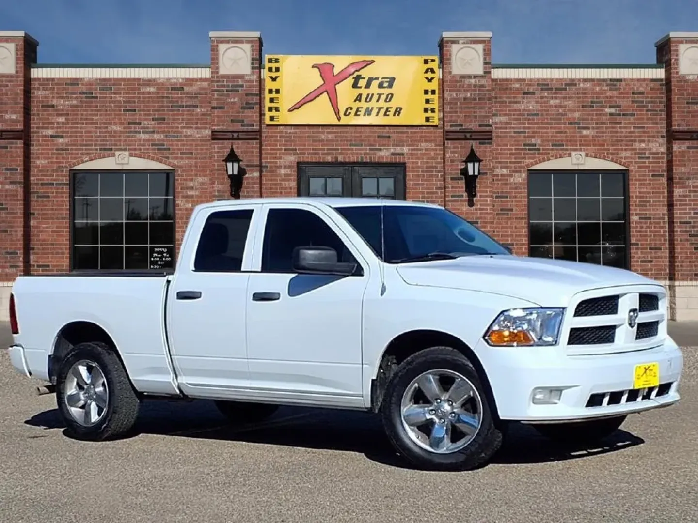 2012 Bright White Clear Coat Ram 1500 ST Quad Cab 2WD (1C6RD6FT1CS) with an Other engine, located at 1401 N. Hobart, Pampa, TX, 79065, (806) 665-9872, 35.549953, -100.975098 - **Conquer the Road with the 2012 Dodge 1500 ST Quad Cab Perfect for Every Adventure!**<br /> <br /> Are you in the market for a reliable truck that can handle your daily commute while still being versatile enough for weekend adventures and family outings? Look no further than the 2012 Dodge 1500 ST - Photo#0