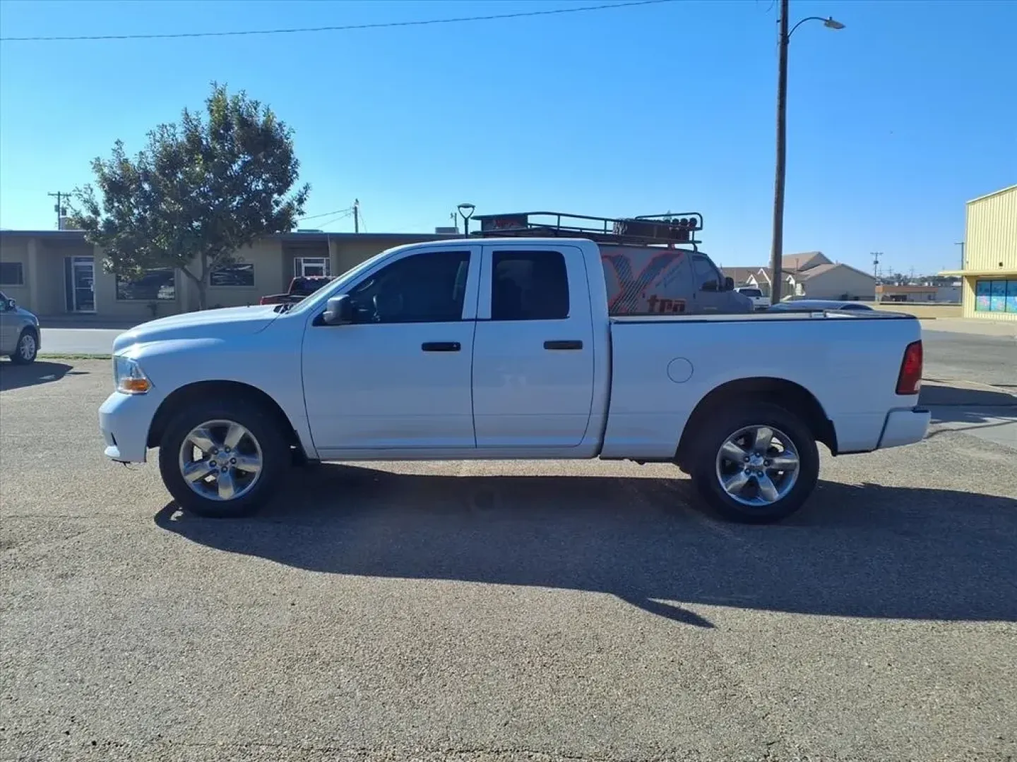 2012 Bright White Clear Coat Ram 1500 ST Quad Cab 2WD (1C6RD6FT1CS) with an Other engine, located at 1401 N. Hobart, Pampa, TX, 79065, (806) 665-9872, 35.549953, -100.975098 - **Conquer the Road with the 2012 Dodge 1500 ST Quad Cab Perfect for Every Adventure!**<br /> <br /> Are you in the market for a reliable truck that can handle your daily commute while still being versatile enough for weekend adventures and family outings? Look no further than the 2012 Dodge 1500 ST - Photo#4