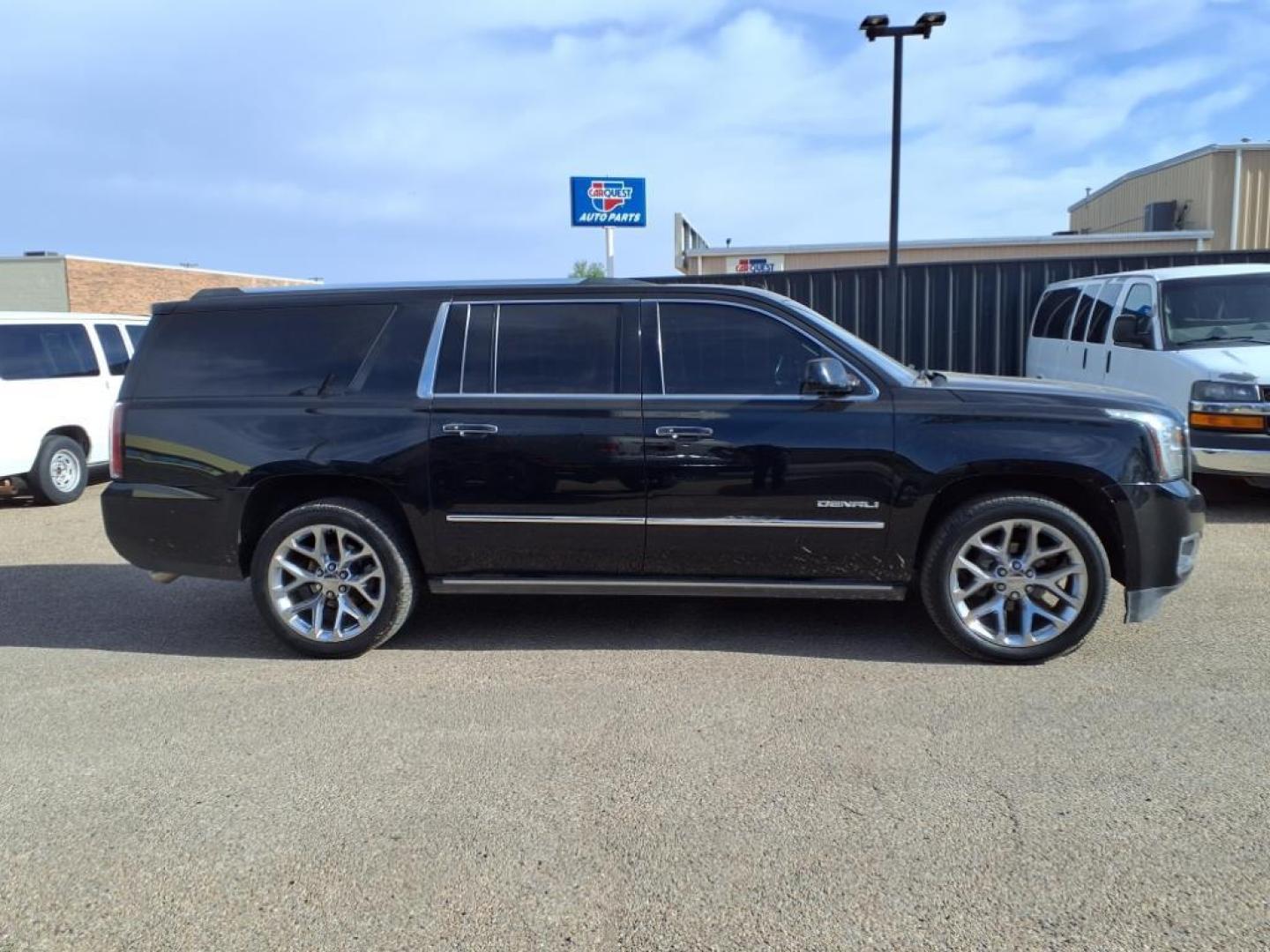 2015 Onyx Black Gba GMC Yukon XL Denali (1GKS2JKJ9FR) with an 6.2L EcoTec3 6.2L V8 420hp 460ft. lbs. Direct Injection engine, Automatic transmission, located at 1401 N. Hobart, Pampa, TX, 79065, (806) 665-9872, 35.549953, -100.975098 - Photo#2