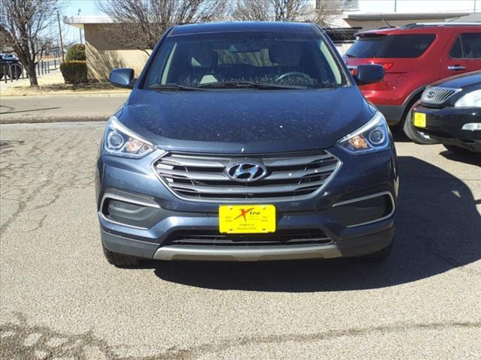 2018 Marlin Blue Hyundai Santa Fe Sport 2.4L (5NMZT3LB7JH) with an 2.4L Theta II 2.4L I4 185hp 17 Fuel Injected engine, 6-Speed Shiftable Automatic transmission, located at 1401 N. Hobart, Pampa, TX, 79065, (806) 665-9872, 35.549641, -100.971878 - Photo #1