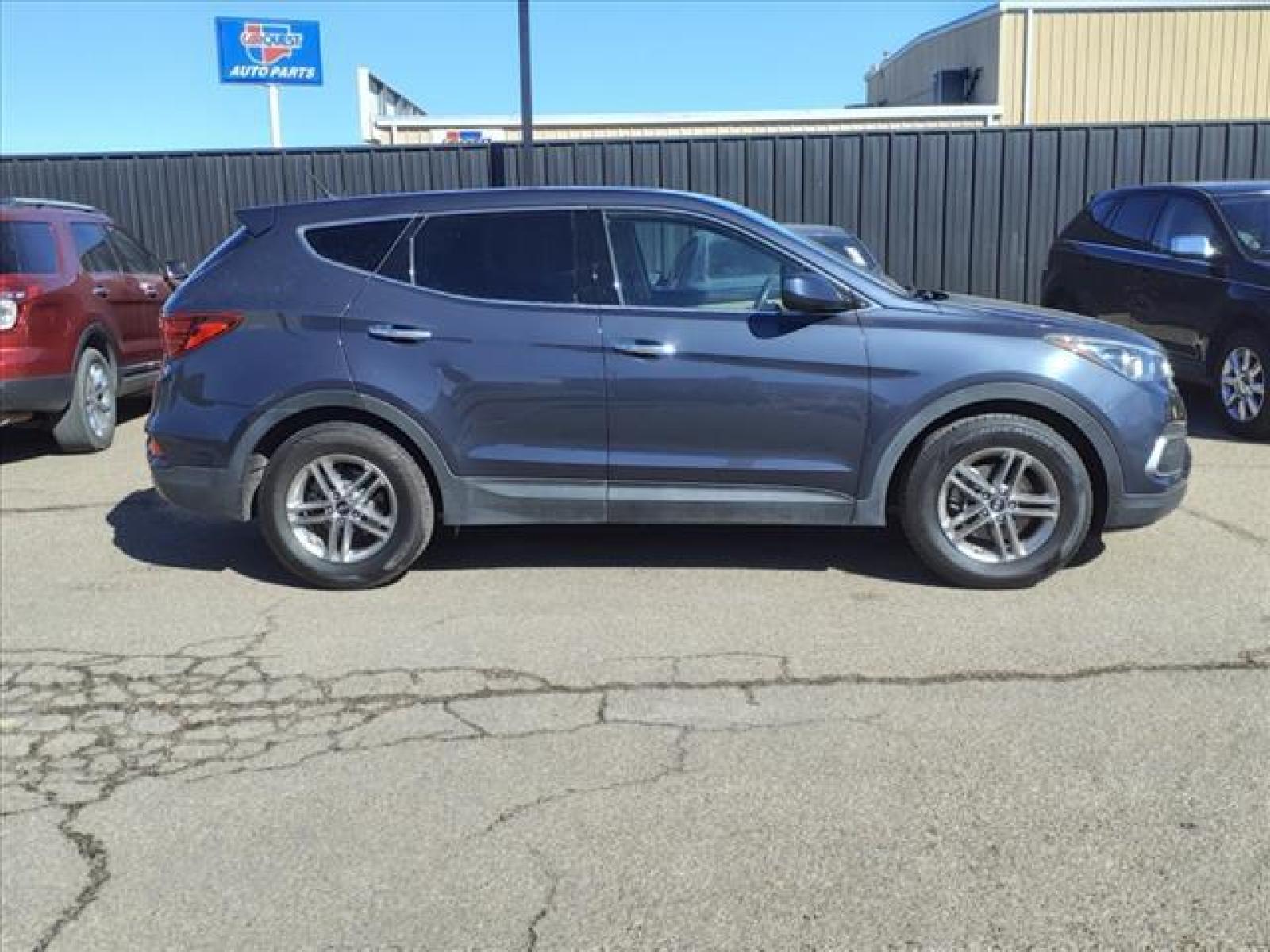 2018 Marlin Blue Hyundai Santa Fe Sport 2.4L (5NMZT3LB7JH) with an 2.4L Theta II 2.4L I4 185hp 17 Fuel Injected engine, 6-Speed Shiftable Automatic transmission, located at 1401 N. Hobart, Pampa, TX, 79065, (806) 665-9872, 35.549641, -100.971878 - Photo #2