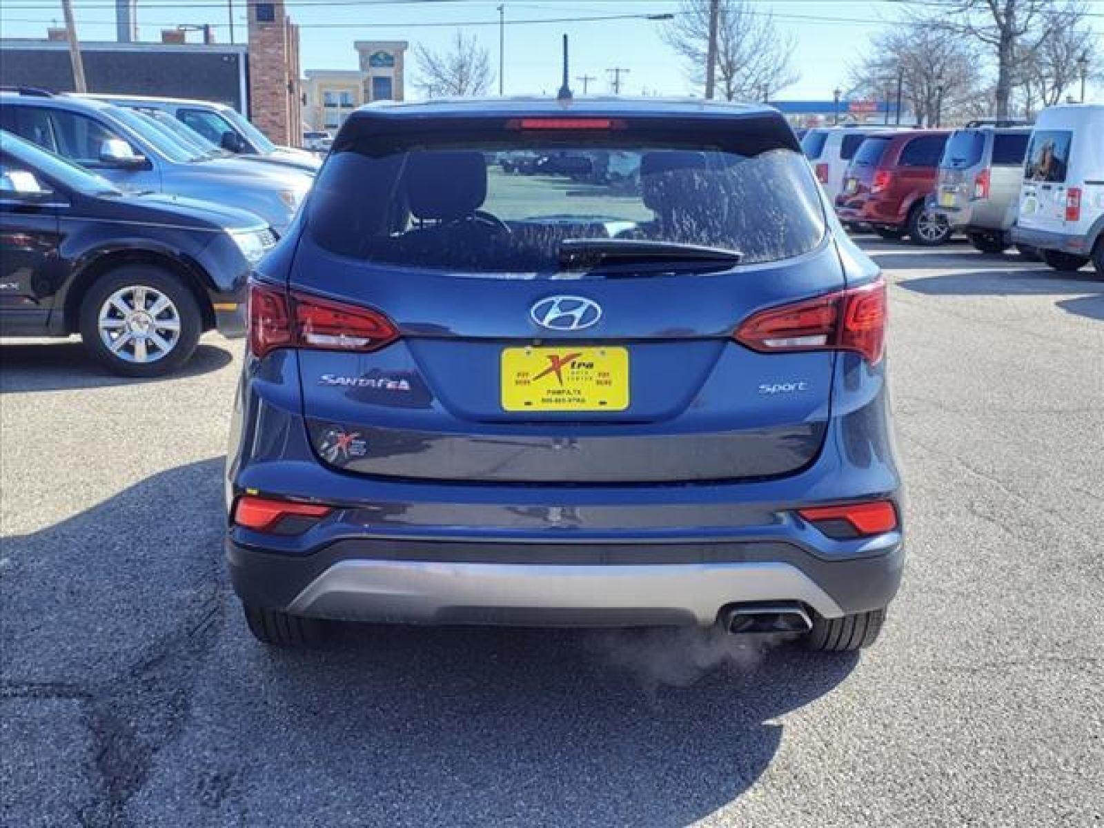 2018 Marlin Blue Hyundai Santa Fe Sport 2.4L (5NMZT3LB7JH) with an 2.4L Theta II 2.4L I4 185hp 17 Fuel Injected engine, 6-Speed Shiftable Automatic transmission, located at 1401 N. Hobart, Pampa, TX, 79065, (806) 665-9872, 35.549641, -100.971878 - Photo #3