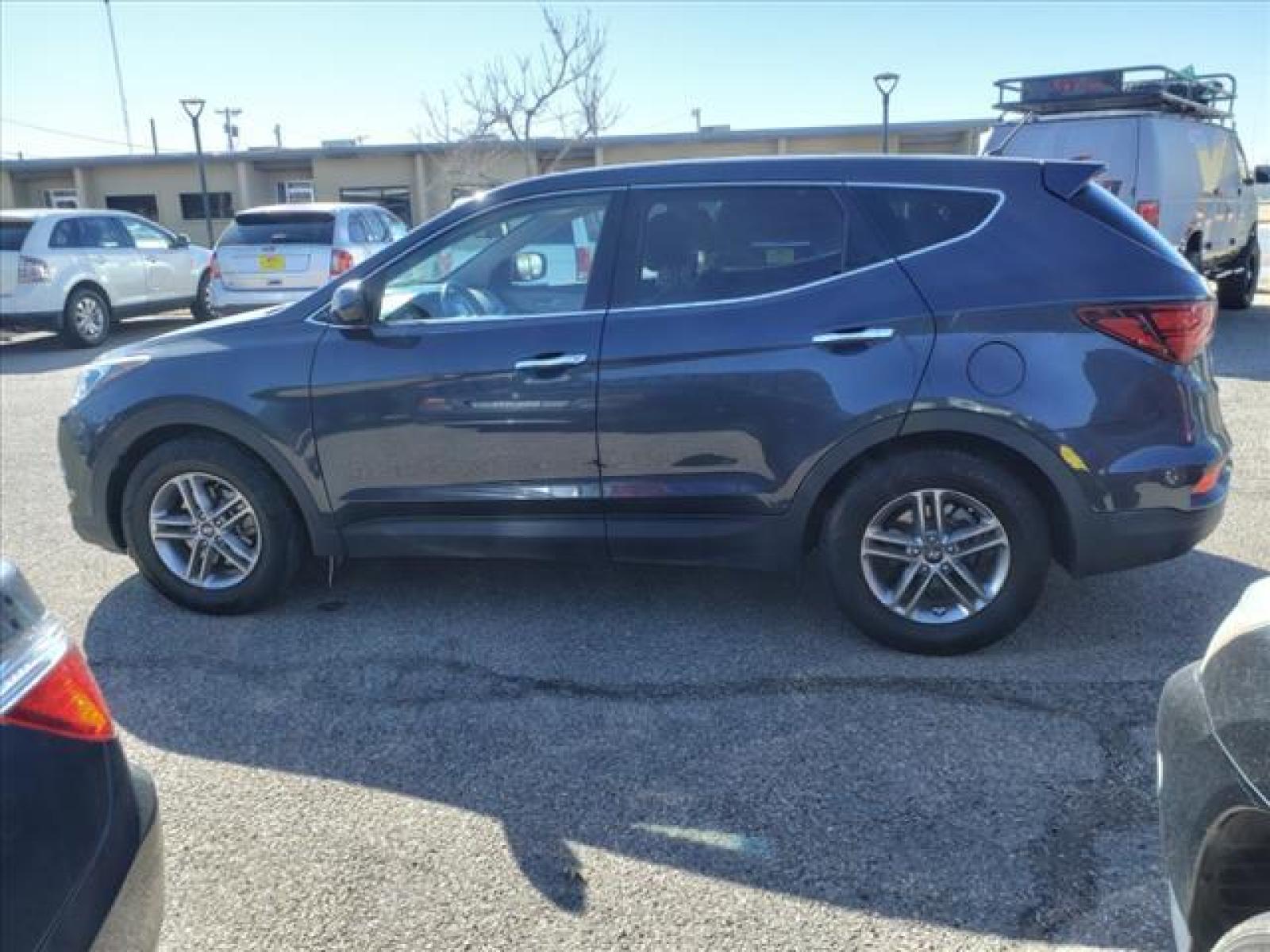 2018 Marlin Blue Hyundai Santa Fe Sport 2.4L (5NMZT3LB7JH) with an 2.4L Theta II 2.4L I4 185hp 17 Fuel Injected engine, 6-Speed Shiftable Automatic transmission, located at 1401 N. Hobart, Pampa, TX, 79065, (806) 665-9872, 35.549641, -100.971878 - Photo #4