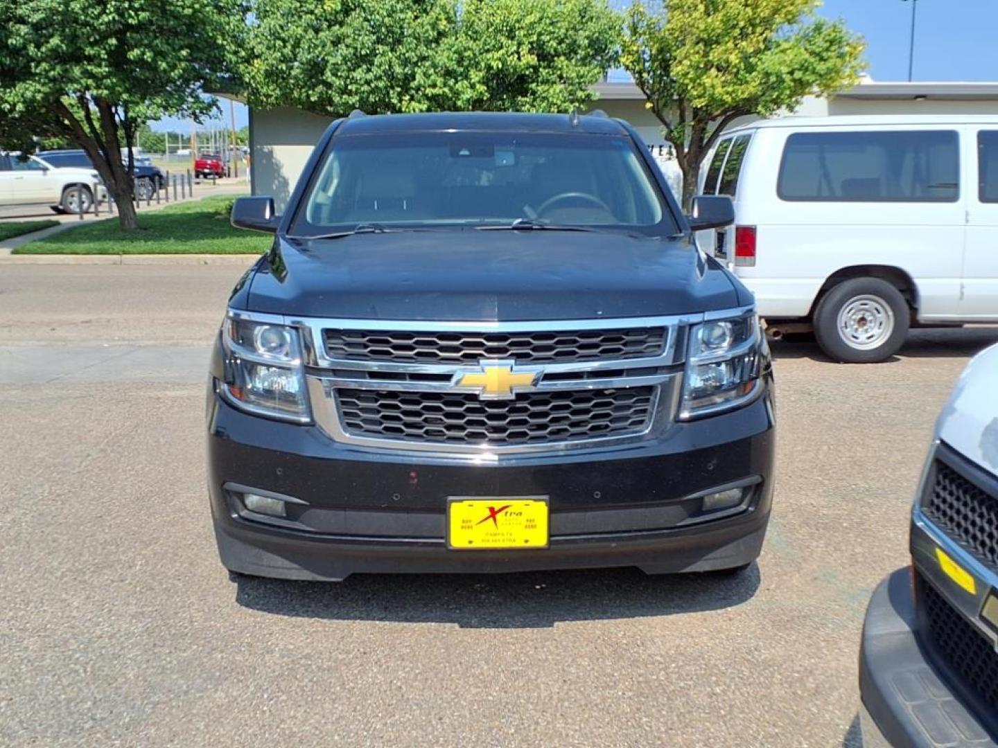 2015 Black Chevrolet Tahoe LT (1GNSCBKC4FR) with an 5.3L EcoTec3 5.3L Flex Fuel V8 355hp 383ft. lbs. Direct Injection engine, 6-Speed Shiftable Automatic w/Overdrive transmission, located at 1401 N. Hobart, Pampa, TX, 79065, (806) 665-9872, 35.549953, -100.975098 - Photo#1