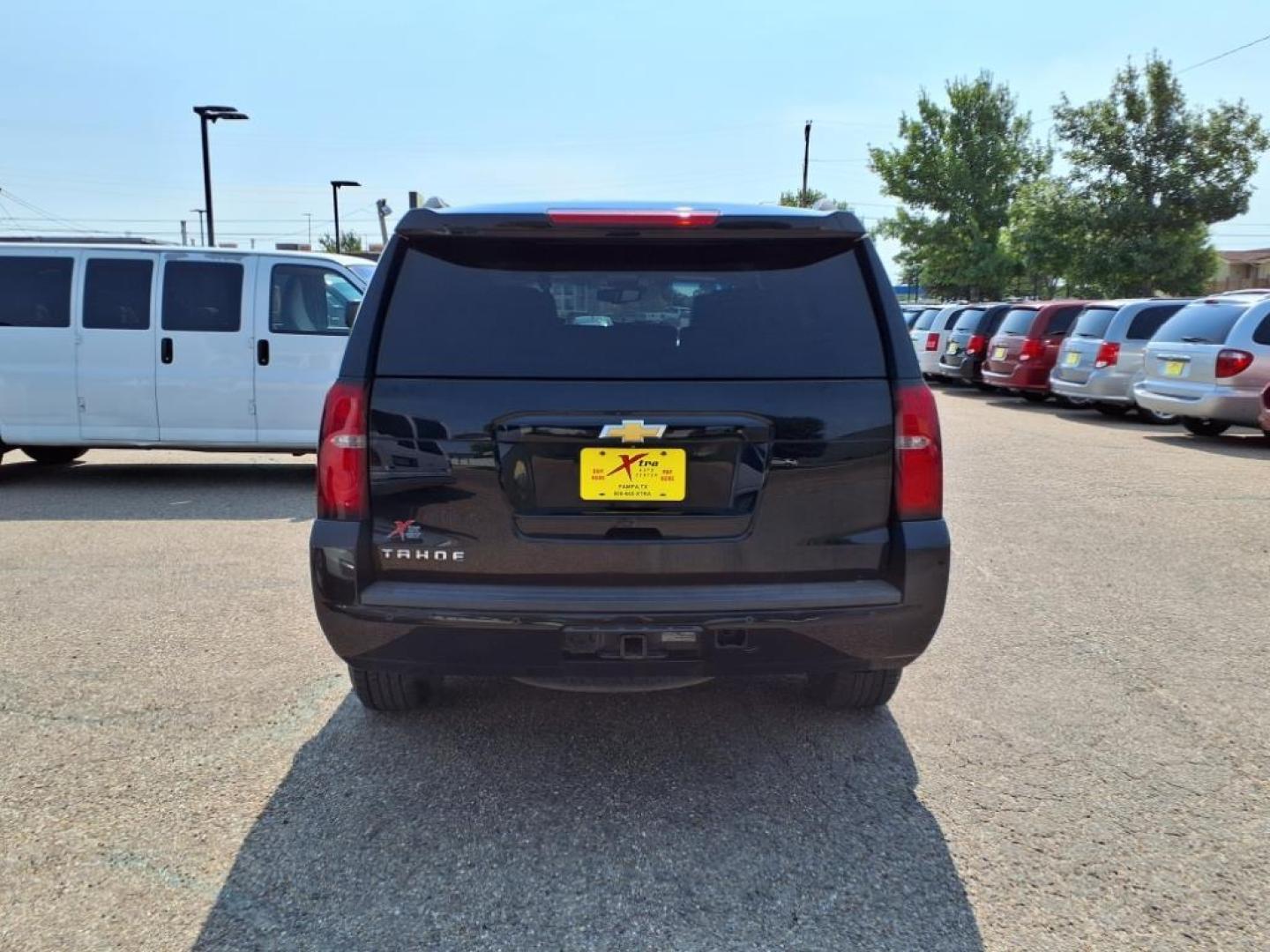 2015 Black Chevrolet Tahoe LT (1GNSCBKC4FR) with an 5.3L EcoTec3 5.3L Flex Fuel V8 355hp 383ft. lbs. Direct Injection engine, 6-Speed Shiftable Automatic w/Overdrive transmission, located at 1401 N. Hobart, Pampa, TX, 79065, (806) 665-9872, 35.549953, -100.975098 - Photo#3