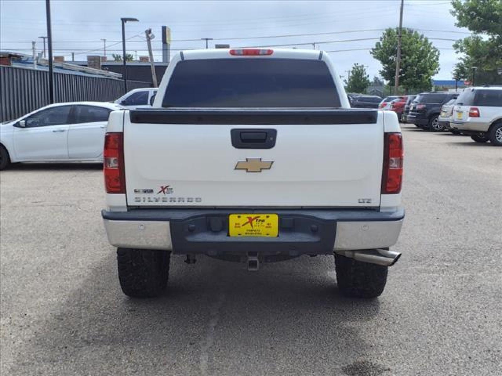 2009 White Diamond Tricoat Chevrolet Silverado 1500 LTZ (3GCEK33349G) with an 5.3L Vortec Aluminum Block 5.3L Flex Fuel V8 315hp 338ft. lbs. Fuel Injected engine, 6-Speed Shiftable Automatic transmission, located at 1401 N. Hobart, Pampa, TX, 79065, (806) 665-9872, 35.549953, -100.975098 - Photo #3