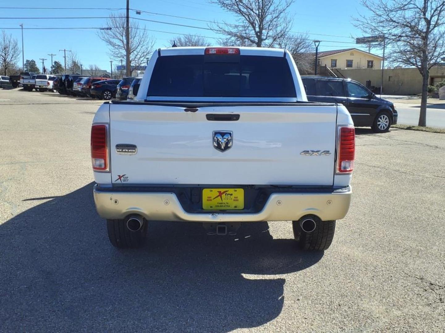 2015 Bright White Clear Coat/White Gold Clear Coat RAM 1500 Laramie Longhorn (1C6RR7PM3FS) with an 3.0L Biodiesel Turbo V6 240hp 420ft. lbs. Common Rail Direct Injection engine, 8-Speed Shiftable Automatic transmission, located at 1401 N. Hobart, Pampa, TX, 79065, (806) 665-9872, 35.549953, -100.975098 - Photo#3