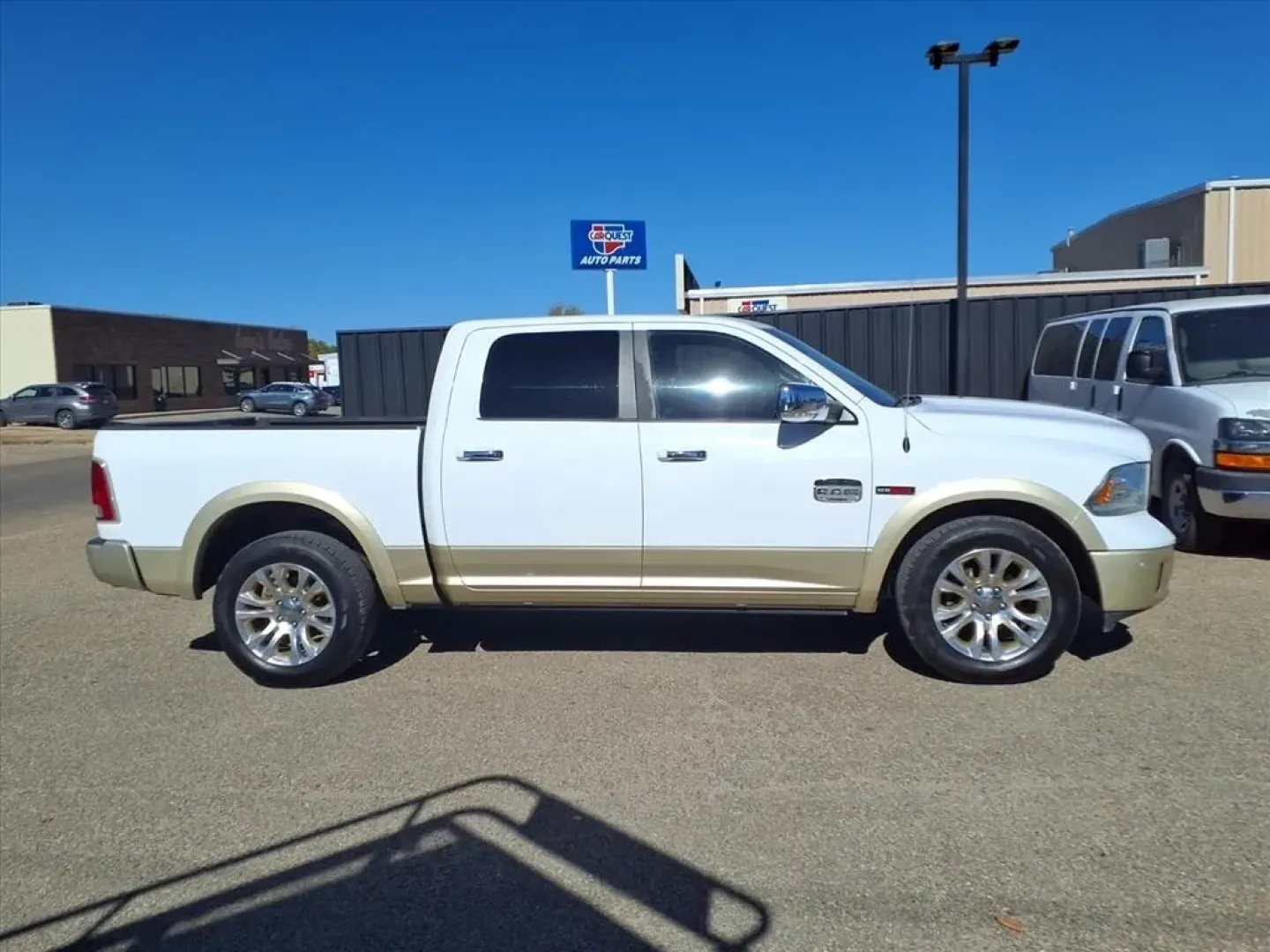 2015 Bright White Clear Coat/White Gold Clear Coat Ram 1500 Longhorn Crew Cab SWB 4WD (1C6RR7PM3FS) with an Other engine, located at 1401 N. Hobart, Pampa, TX, 79065, (806) 665-9872, 35.549953, -100.975098 - Unleash your adventurous spirit with the 2015 Ram 1500 Longhorn Crew Cab SWB 4WD, a perfect companion for weekend getaways or your daily commute in and around Pampa, TX. Whether you need a reliable truck for hauling cargo or a spacious vehicle for family outings, this versatile pickup is designed to - Photo#2
