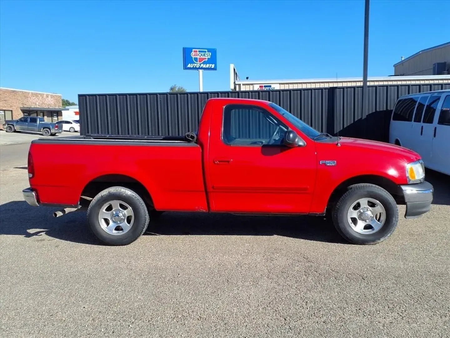 2003 Bright Red Clearcoat Ford F-150 XL 2WD (1FTRF17283N) with an Other engine, located at 1401 N. Hobart, Pampa, TX, 79065, (806) 665-9872, 35.549953, -100.975098 - Discover the ultimate workhorse that seamlessly blends reliability with versatility the 2003 Ford F-150 XL 2WD. Perfect for those who need a dependable truck for work, weekend adventures, or hauling your growing family's gear, this truck is designed to tackle any challenge. Whether you're commuting - Photo#2