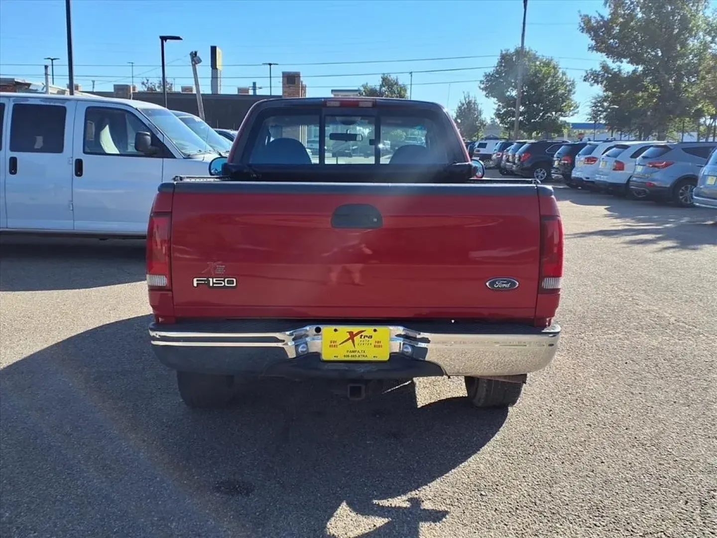 2003 Bright Red Clearcoat Ford F-150 XL 2WD (1FTRF17283N) with an Other engine, located at 1401 N. Hobart, Pampa, TX, 79065, (806) 665-9872, 35.549953, -100.975098 - Discover the ultimate workhorse that seamlessly blends reliability with versatility the 2003 Ford F-150 XL 2WD. Perfect for those who need a dependable truck for work, weekend adventures, or hauling your growing family's gear, this truck is designed to tackle any challenge. Whether you're commuting - Photo#3