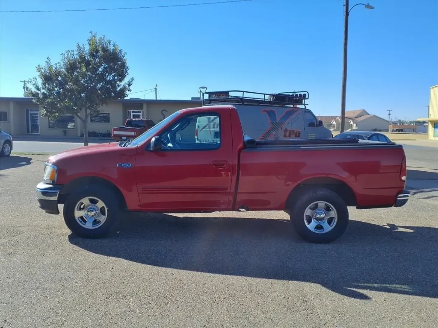 2003 Bright Red Clearcoat Ford F-150 XL 2WD (1FTRF17283N) with an Other engine, located at 1401 N. Hobart, Pampa, TX, 79065, (806) 665-9872, 35.549953, -100.975098 - Discover the ultimate workhorse that seamlessly blends reliability with versatility the 2003 Ford F-150 XL 2WD. Perfect for those who need a dependable truck for work, weekend adventures, or hauling your growing family's gear, this truck is designed to tackle any challenge. Whether you're commuting - Photo#4