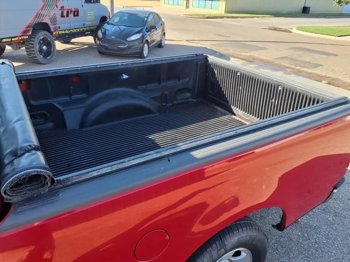 2003 Bright Red Clearcoat Ford F-150 XL 2WD (1FTRF17283N) with an Other engine, located at 1401 N. Hobart, Pampa, TX, 79065, (806) 665-9872, 35.549953, -100.975098 - Discover the ultimate workhorse that seamlessly blends reliability with versatility the 2003 Ford F-150 XL 2WD. Perfect for those who need a dependable truck for work, weekend adventures, or hauling your growing family's gear, this truck is designed to tackle any challenge. Whether you're commuting - Photo#5