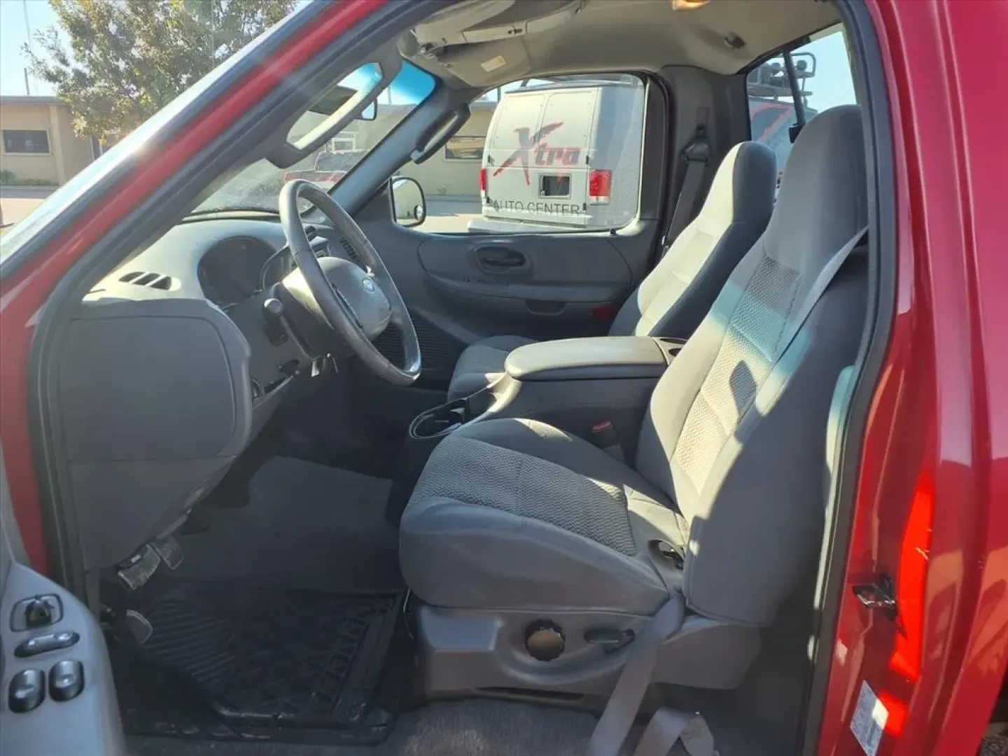 2003 Bright Red Clearcoat Ford F-150 XL 2WD (1FTRF17283N) with an Other engine, located at 1401 N. Hobart, Pampa, TX, 79065, (806) 665-9872, 35.549953, -100.975098 - Discover the ultimate workhorse that seamlessly blends reliability with versatility the 2003 Ford F-150 XL 2WD. Perfect for those who need a dependable truck for work, weekend adventures, or hauling your growing family's gear, this truck is designed to tackle any challenge. Whether you're commuting - Photo#11